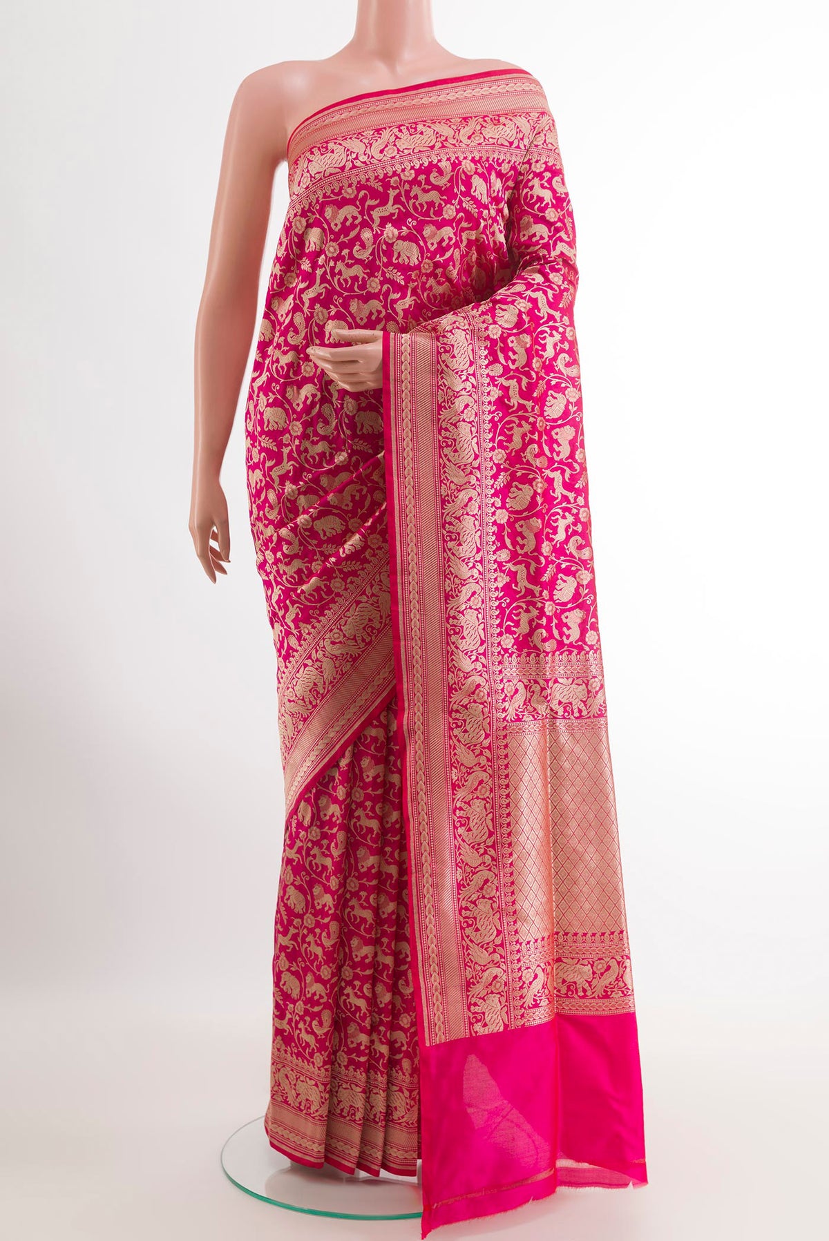Pink Banarasi Silk Saree with Zari Brocade on the body and Zari Border.  displayed on a mannequin