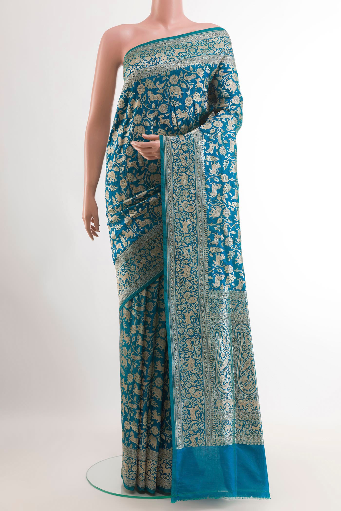 Blue Banarasi Silk Saree with Zari Brocade on the body and Zari Border.  displayed on a mannequin
