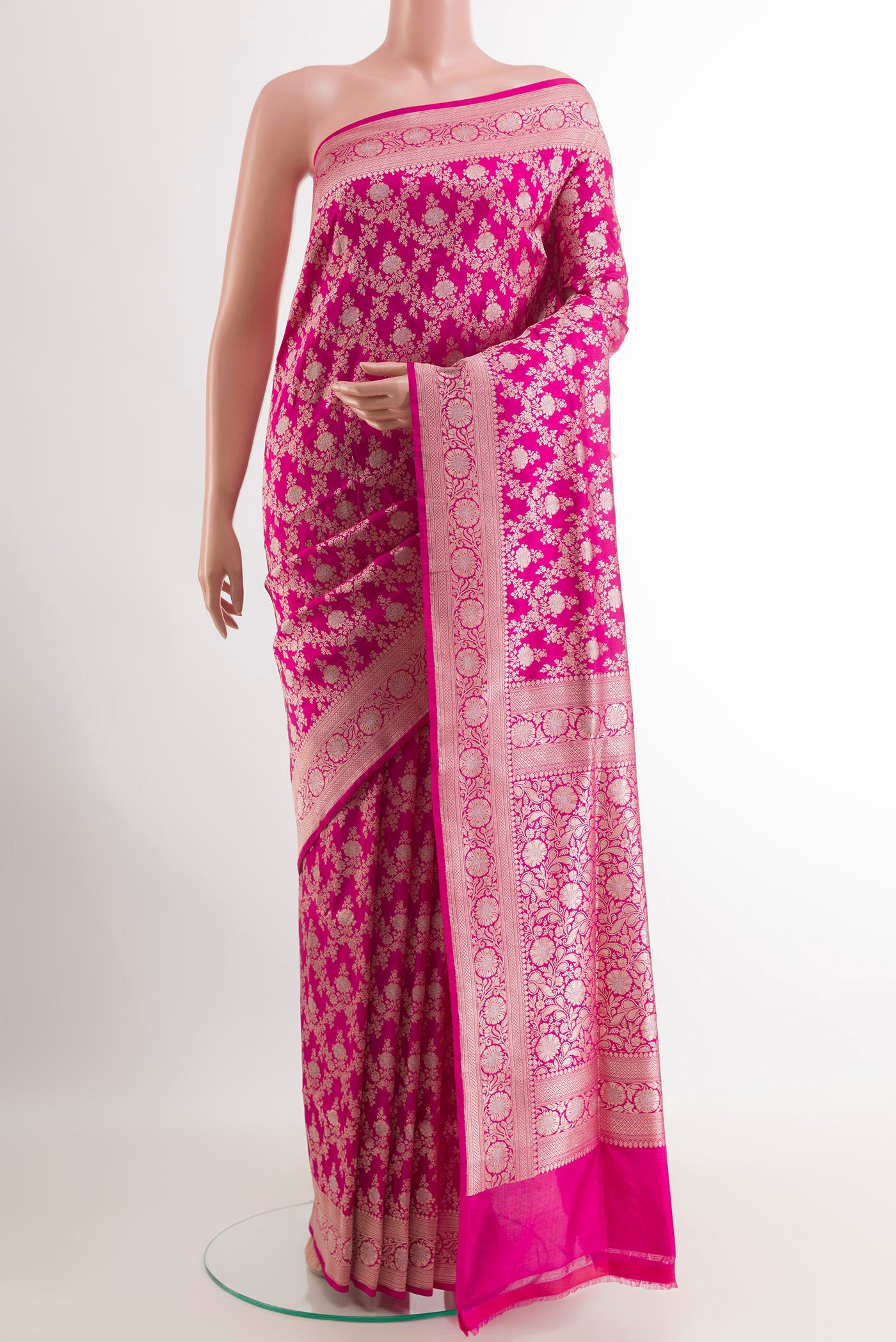 Pink Banarasi Silk Saree with Zari Brocade on the body and Zari Border.  displayed on a mannequin