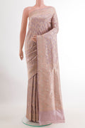 Lavender Banarasi Silk Saree with Zari Brocade on the body and Zari Border.  displayed on a mannequin