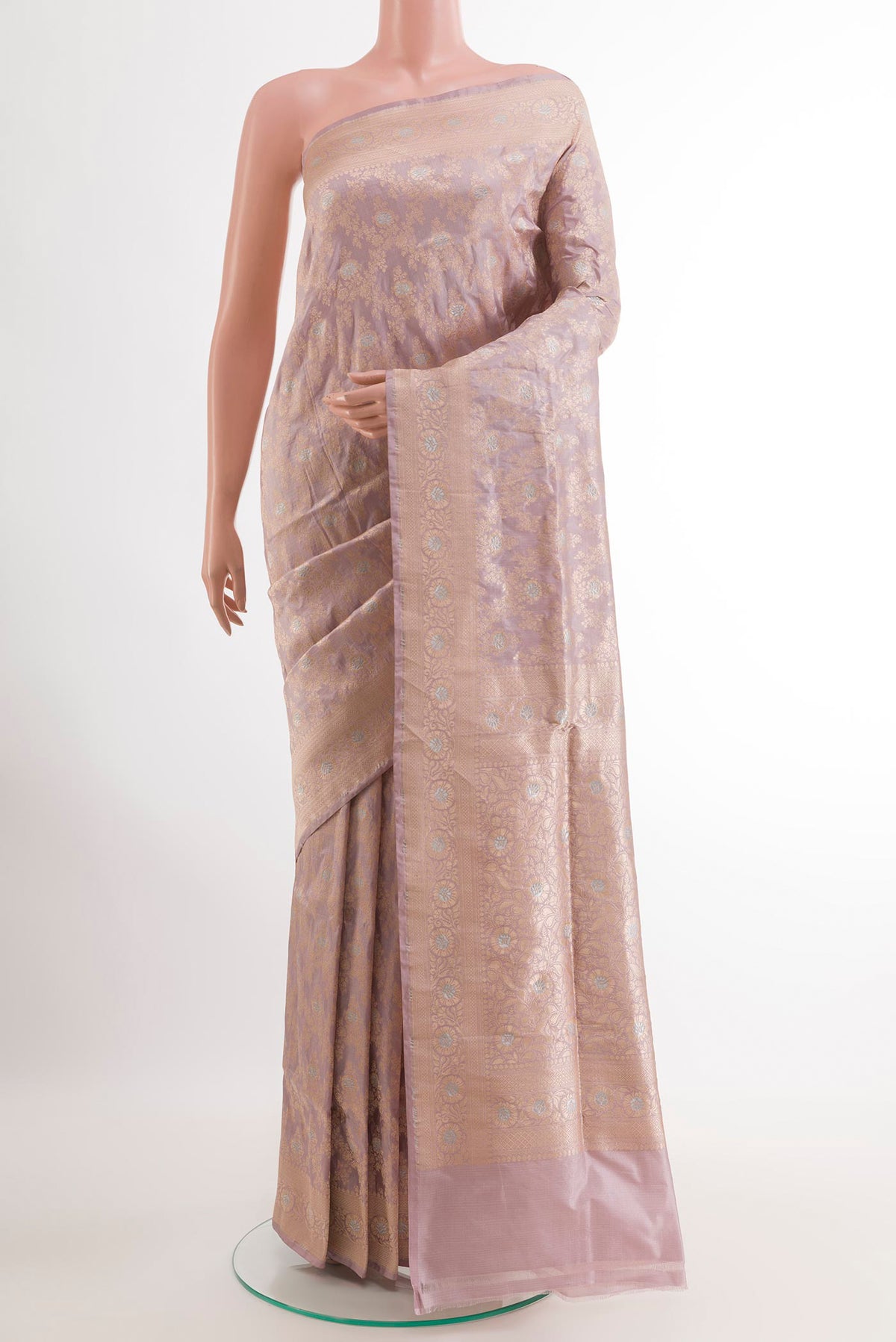 Lavender Banarasi Silk Saree with Zari Brocade on the body and Zari Border.  displayed on a mannequin