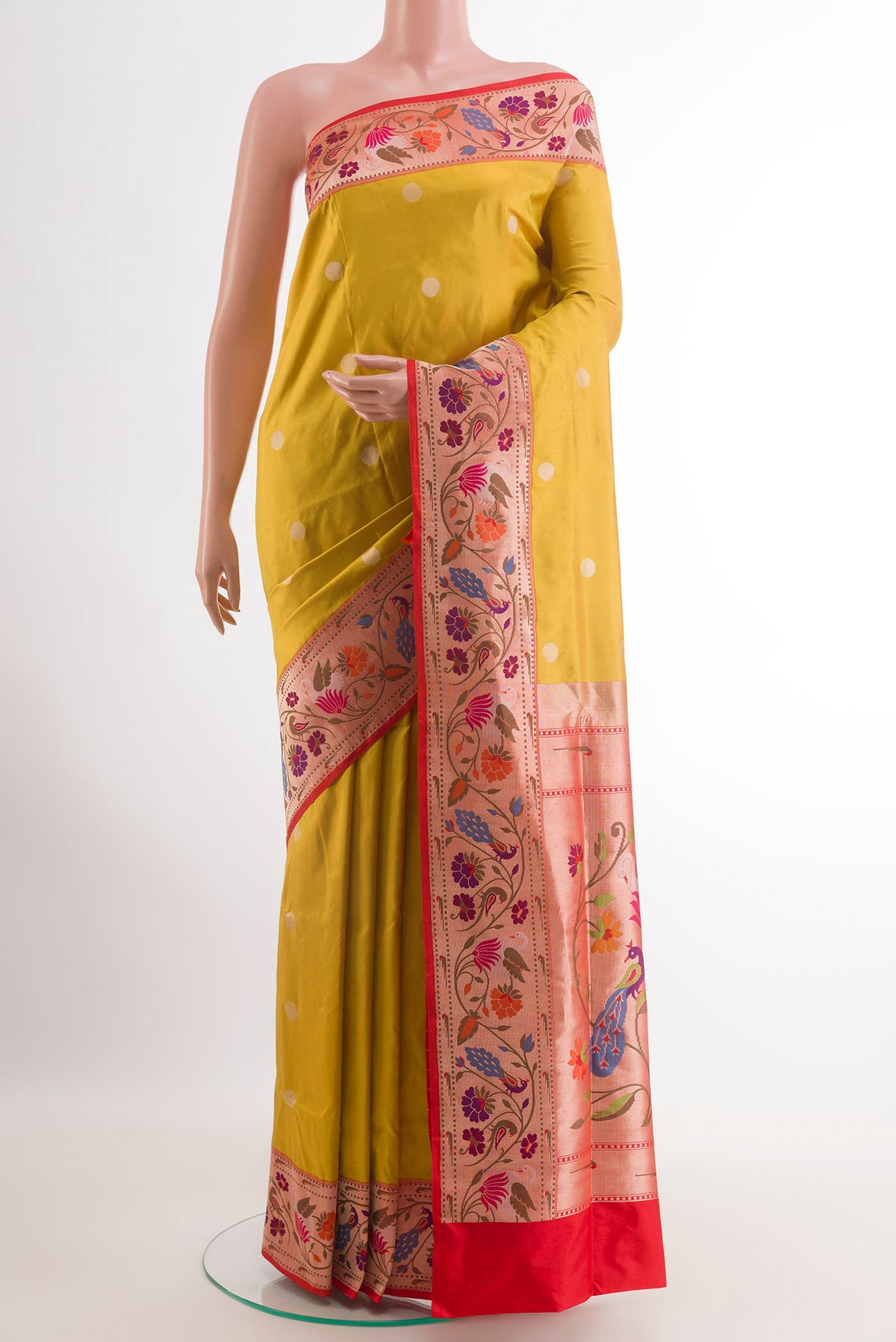 Lemon Yellow Banarasi Silk Saree with Zari Butta on the body and Zari Border.  displayed on a mannequin