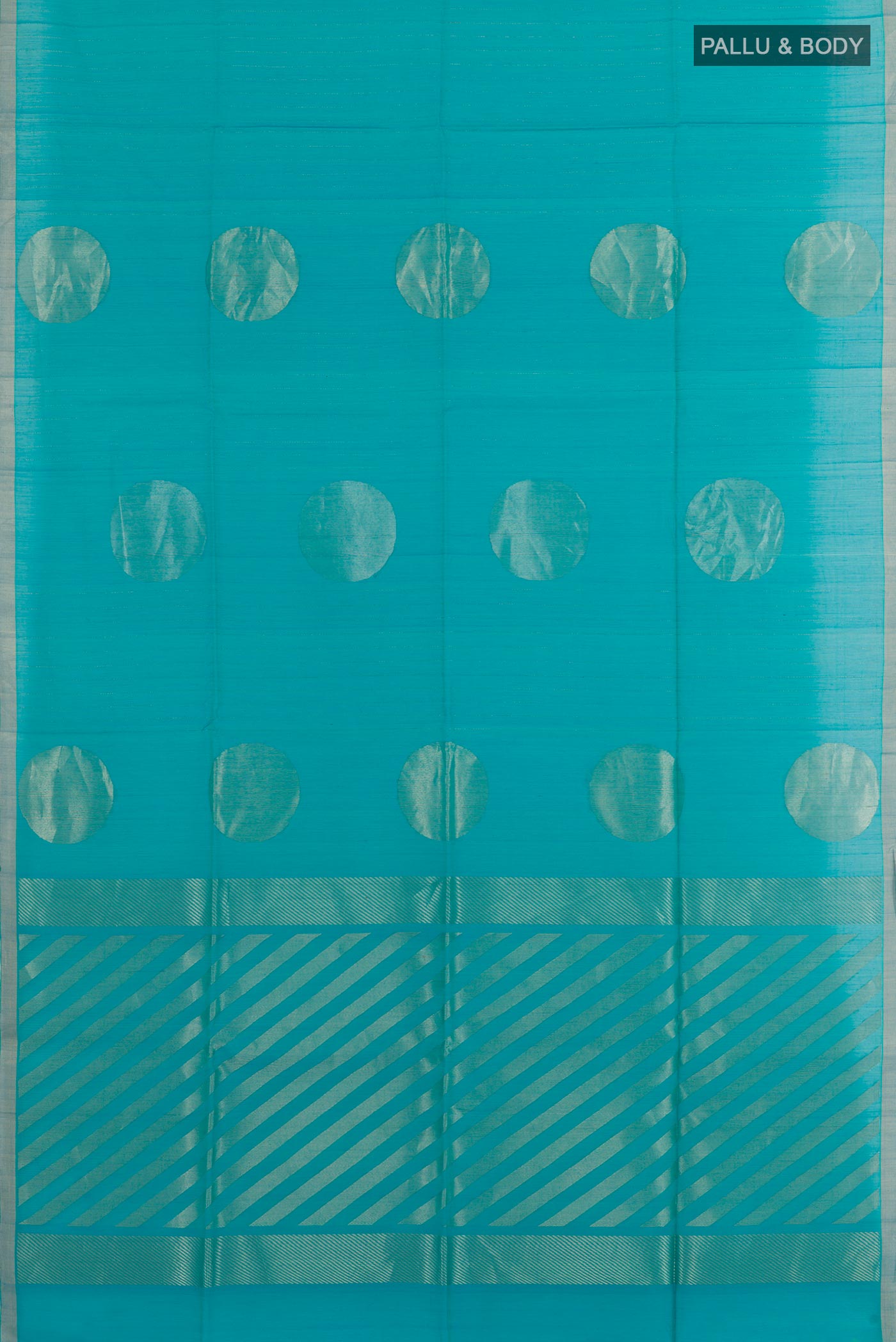 Flat view of Blue Blended Kora Cotton Saree with Zari Butta on the body and Zari Border. 