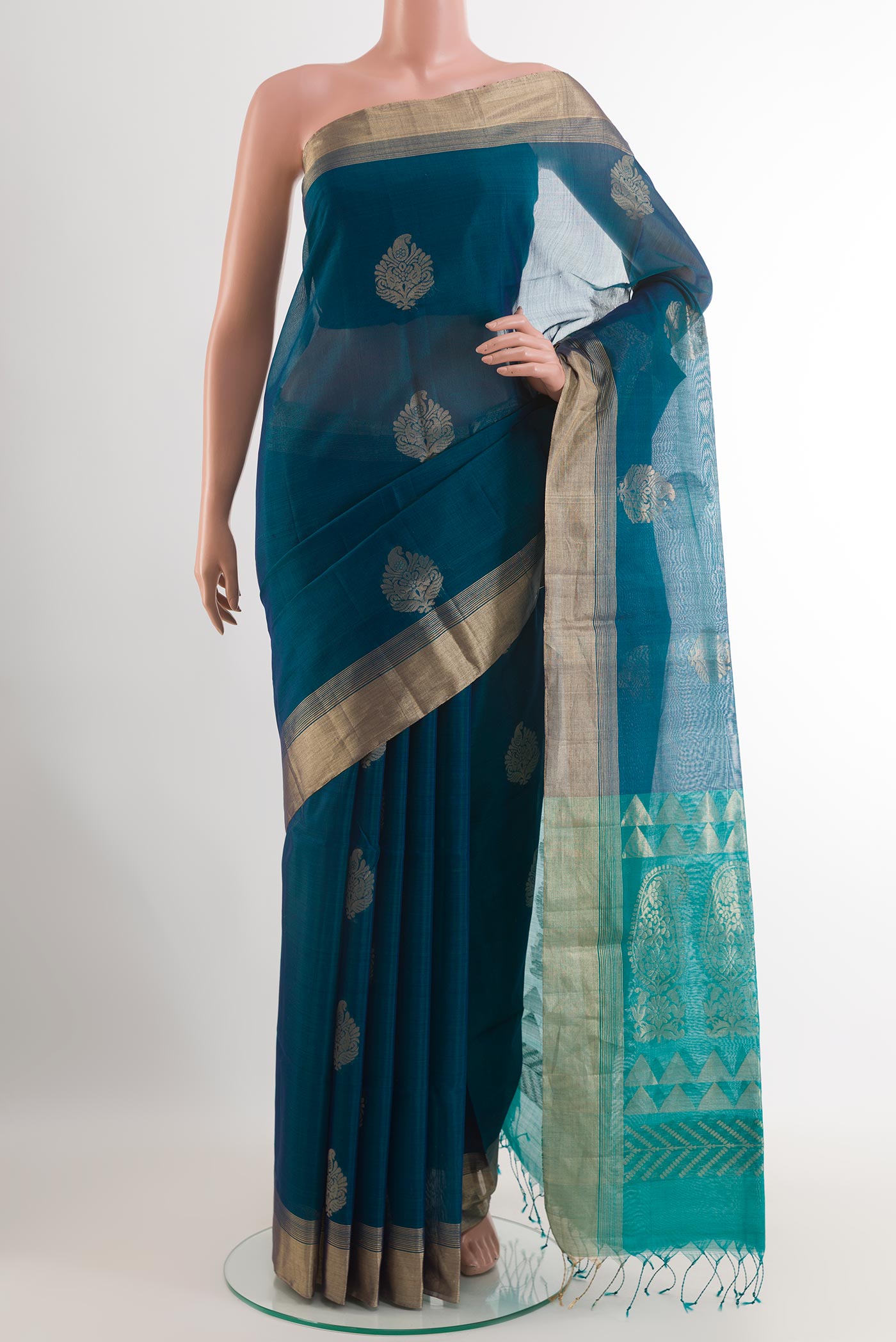 Blue Blended Kora Cotton Saree with Zari Butta on the body and Zari Border.  displayed on a mannequin