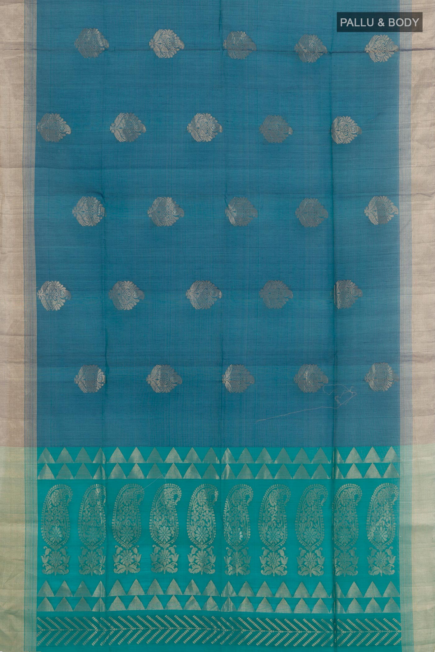 Flat view of Blue Blended Kora Cotton Saree with Zari Butta on the body and Zari Border. 