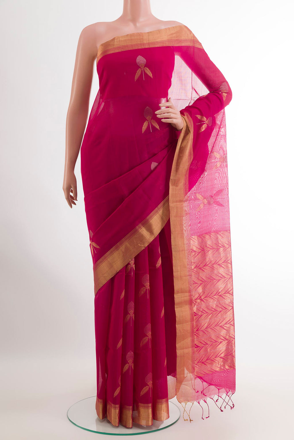 Pink Blended Kora Cotton Saree with Zari Butta on the body and Zari Border.  displayed on a mannequin