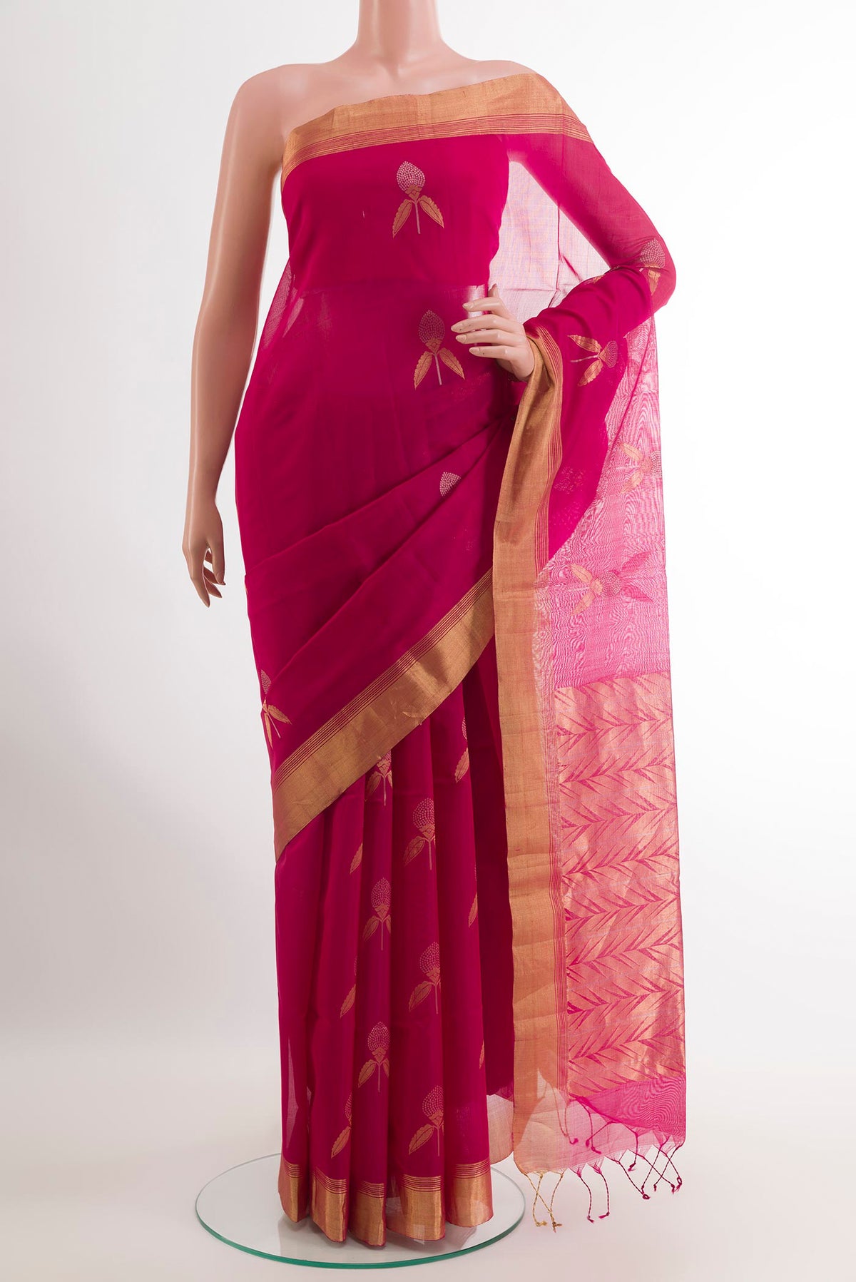 Pink Blended Kora Cotton Saree with Zari Butta on the body and Zari Border.  displayed on a mannequin