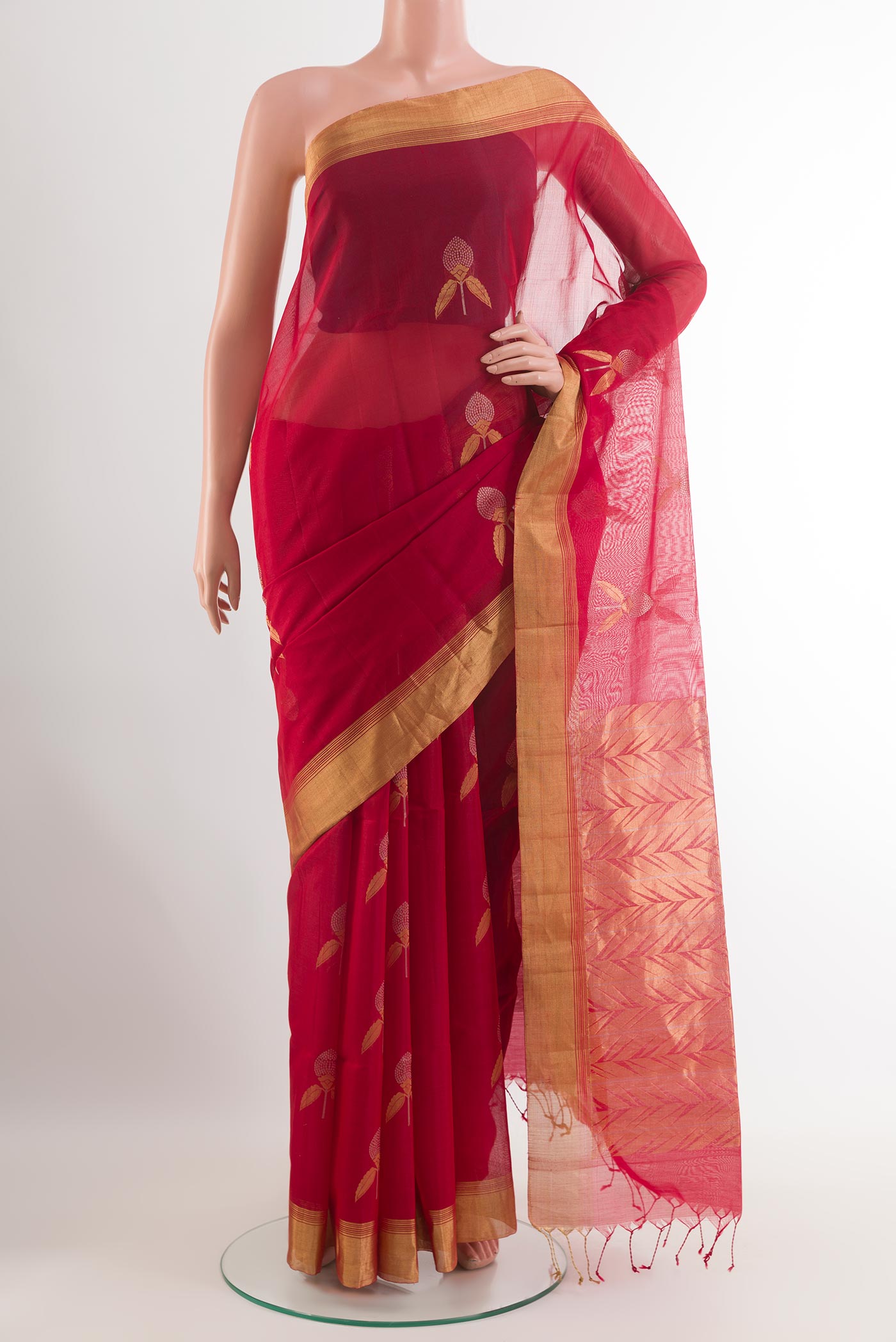 Red Blended Kora Cotton Saree with Zari Butta on the body and Zari Border.  displayed on a mannequin