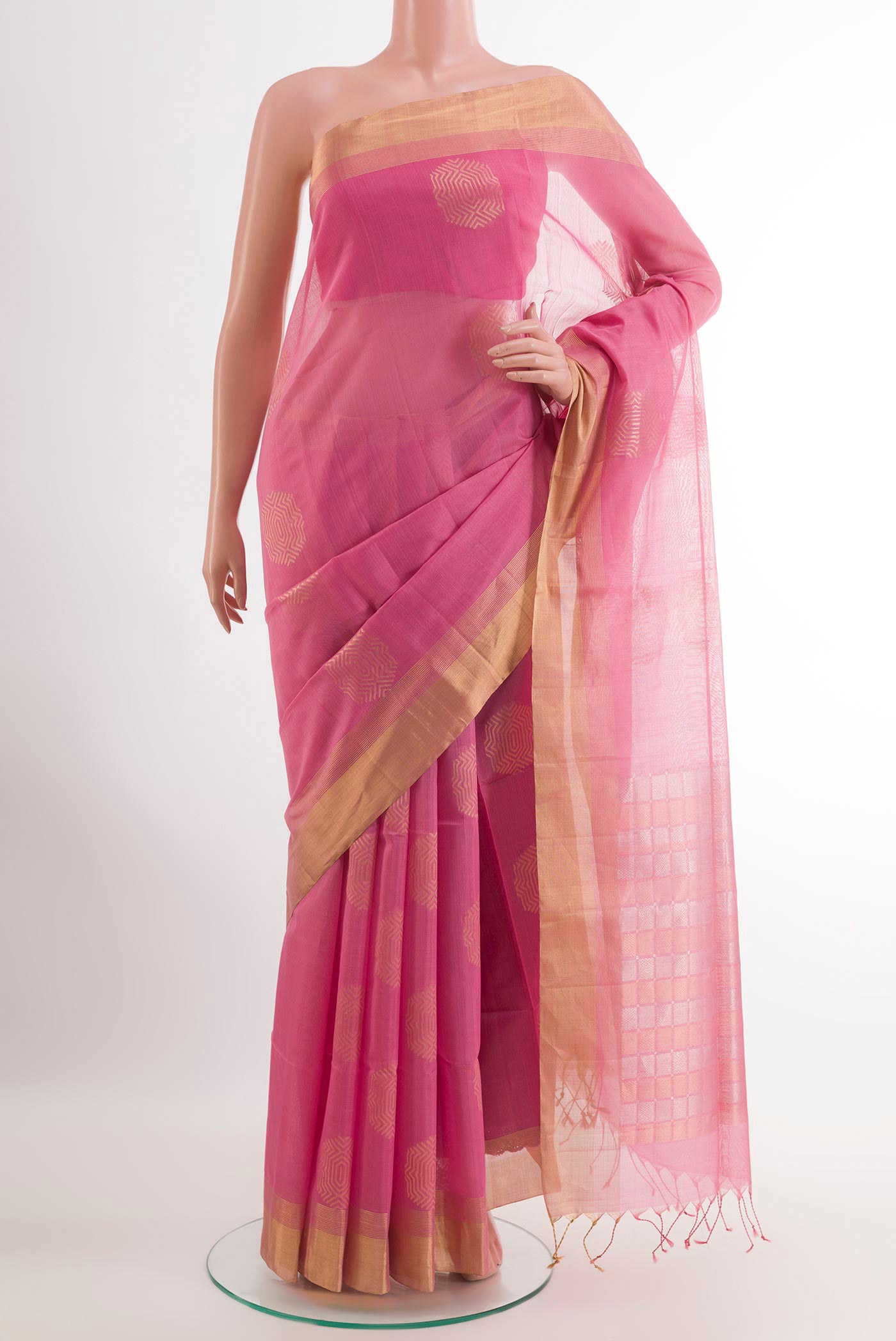 Pink Blended Kora Cotton Saree with Zari Butta on the body and Zari Border.  displayed on a mannequin