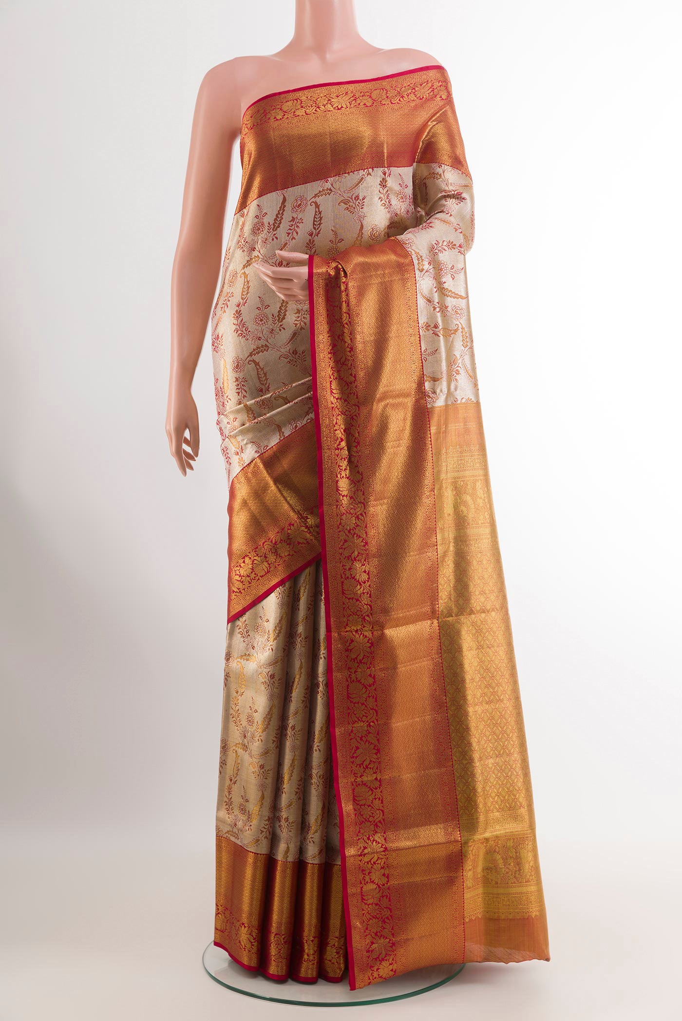 Silver Kanjivaram Tissue Silk Saree with Zari Brocade on the body and Zari Border.  displayed on a mannequin
