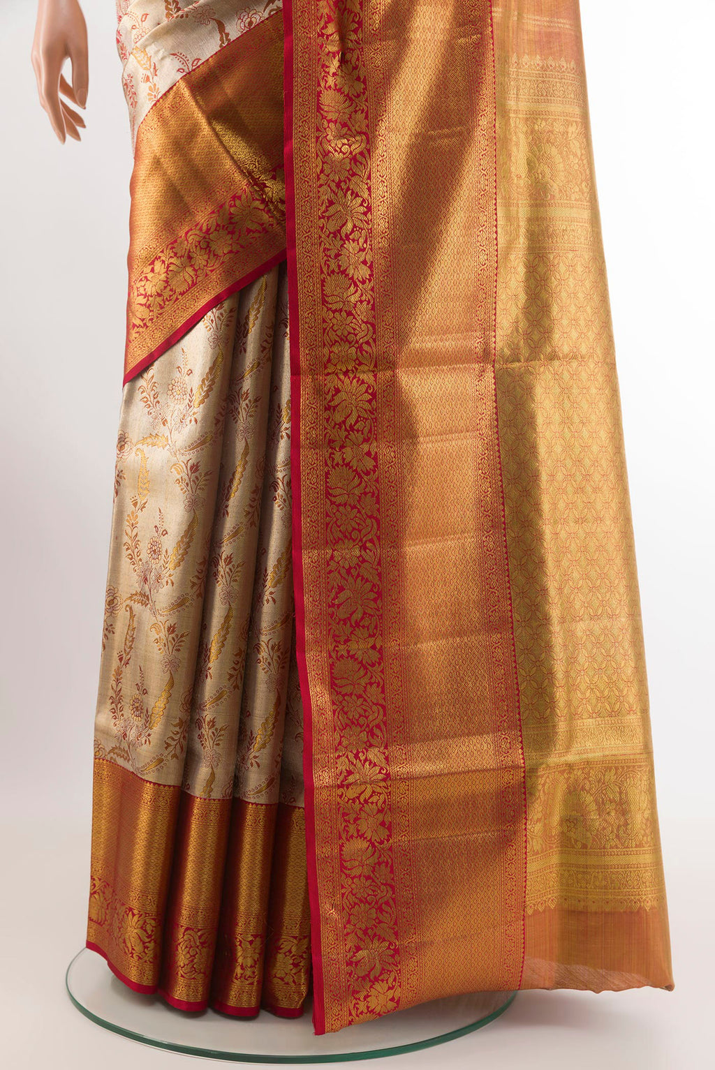 Pleats and pallu of Silver Kanjivaram Tissue Silk Saree with Zari Brocade on the body and Zari Border. 