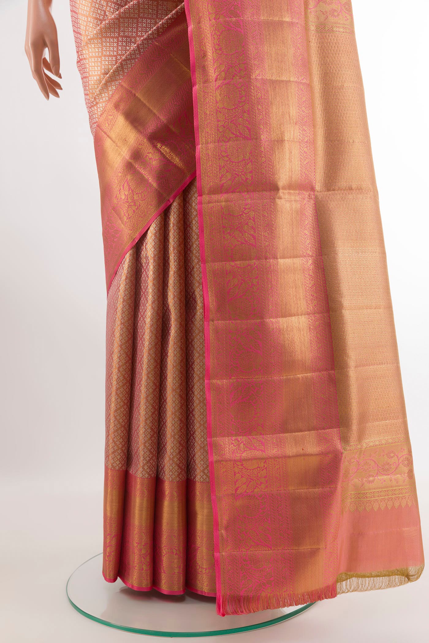 Pleats and pallu of Rose Gold Kanjivaram Tissue Silk Saree with Zari Brocade on the body and Zari Border. 
