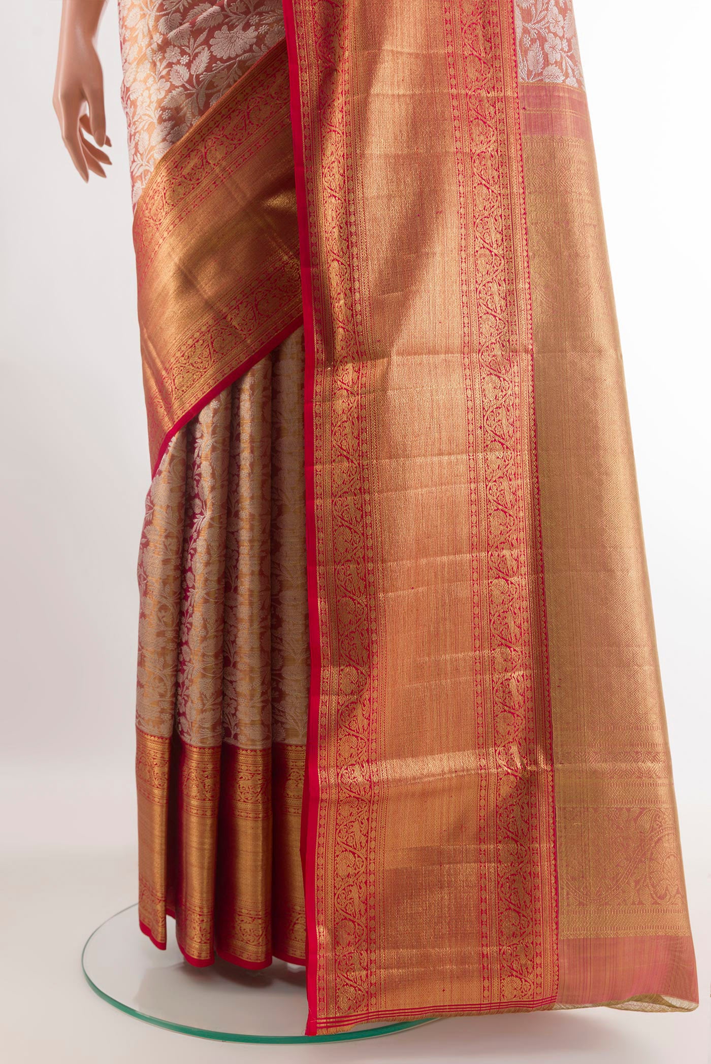 Pleats and pallu of Golden Peach Kanjivaram Tissue Silk Saree with Zari Brocade on the body and Zari Border. 