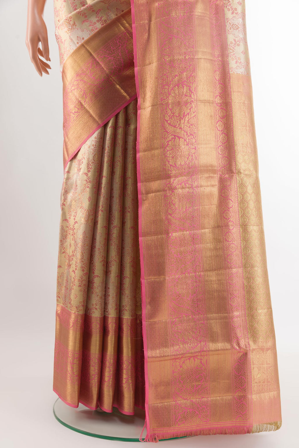Pleats and pallu of Rose Gold Kanjivaram Tissue Silk Saree with Zari Brocade on the body and Zari Border. 