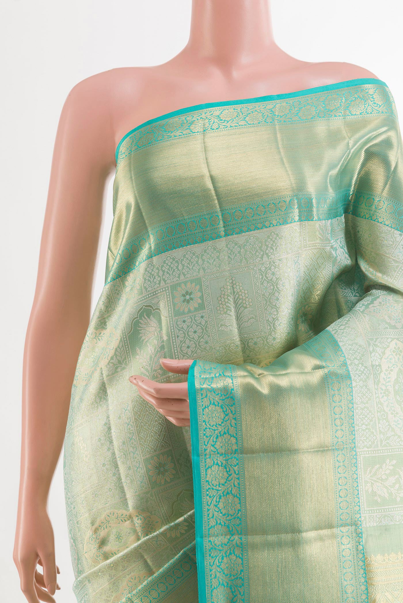 Border image of Sea Green Kanjivaram Tissue Silk Saree with Zari Brocade on the body and Zari Border. 