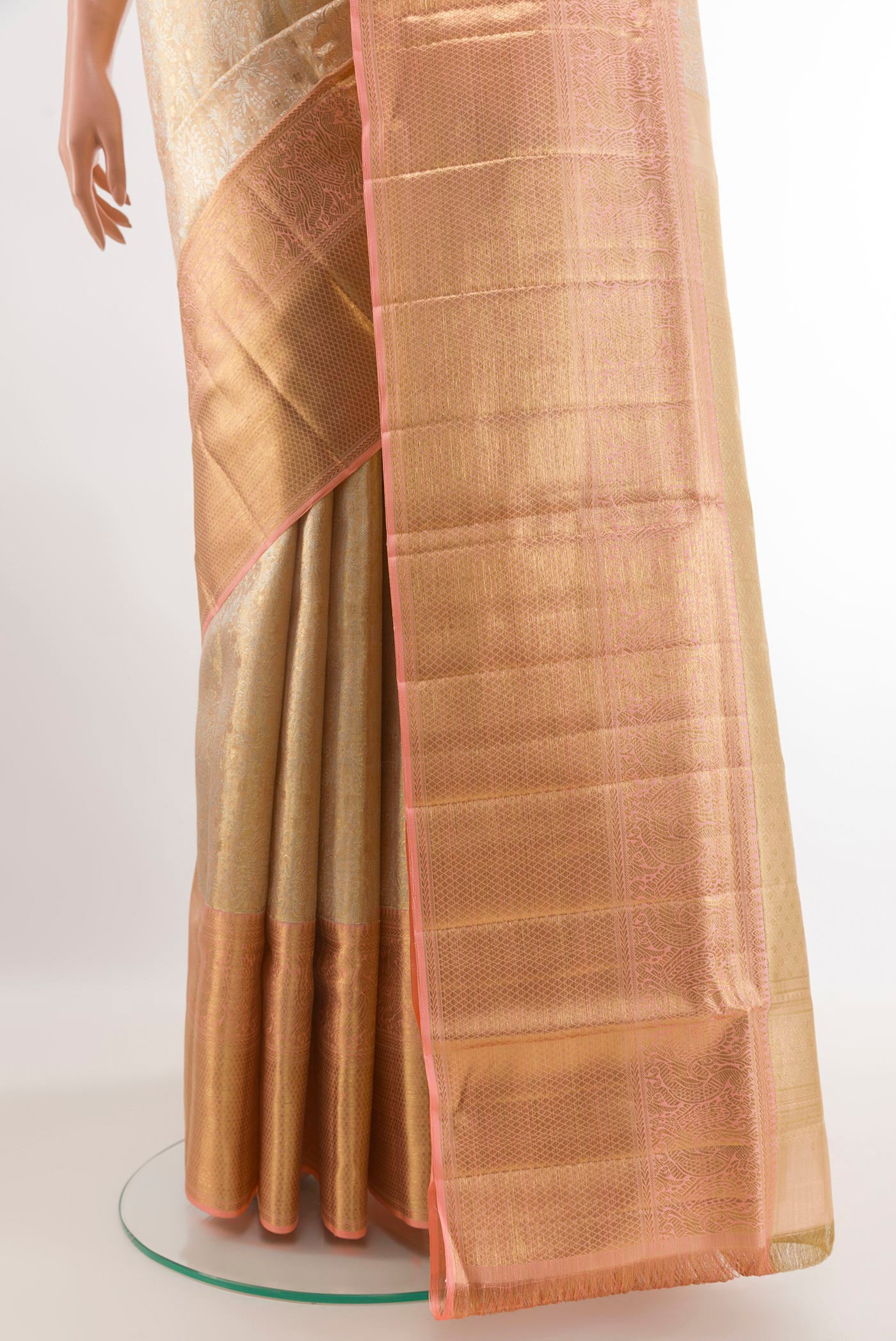 Pleats and pallu of Rose Gold Kanjivaram Tissue Silk Saree with Zari Brocade on the body and Zari Border. 