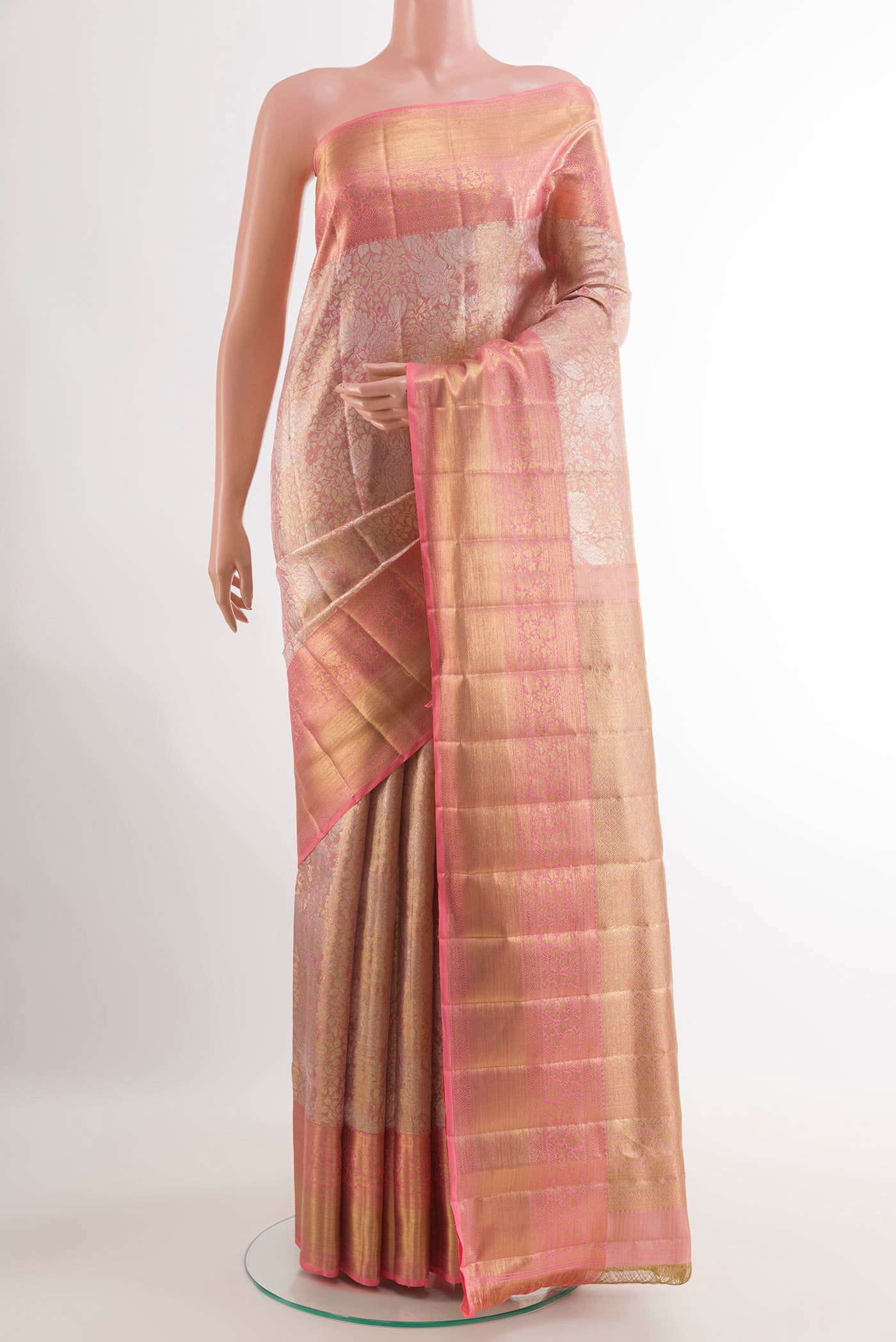 Pink Kanjivaram Tissue Silk Saree with Zari Brocade on the body and Zari Border.  displayed on a mannequin