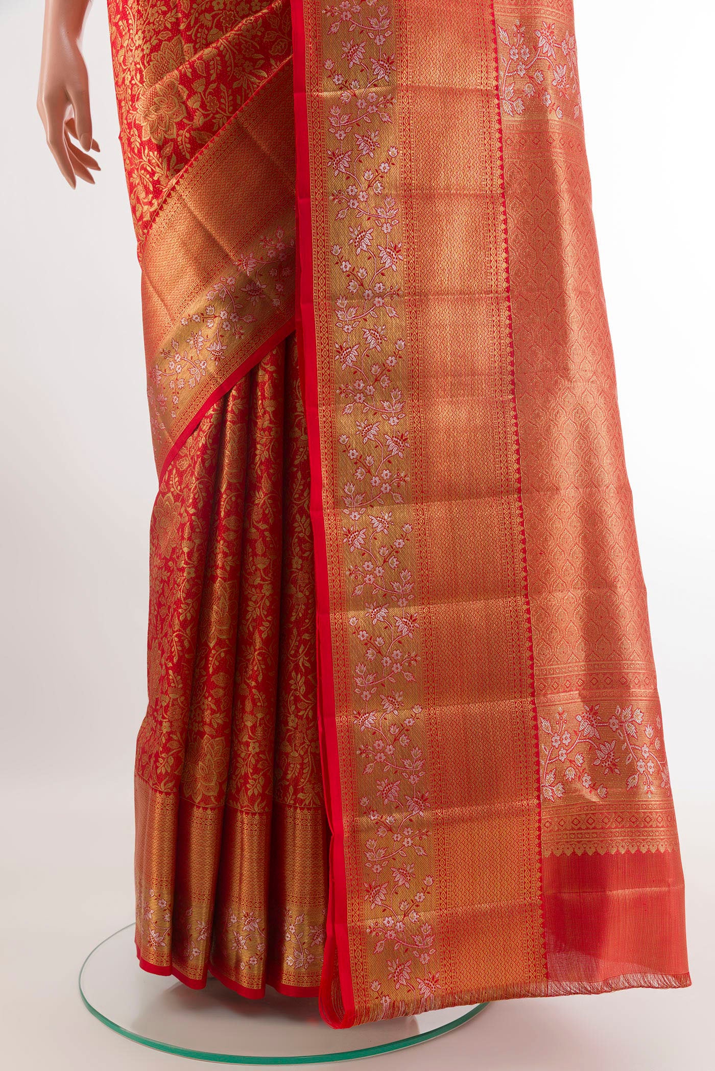 Pleats and pallu of Red Kanjivaram Tissue Silk Saree with Zari Brocade on the body and Zari Border. 