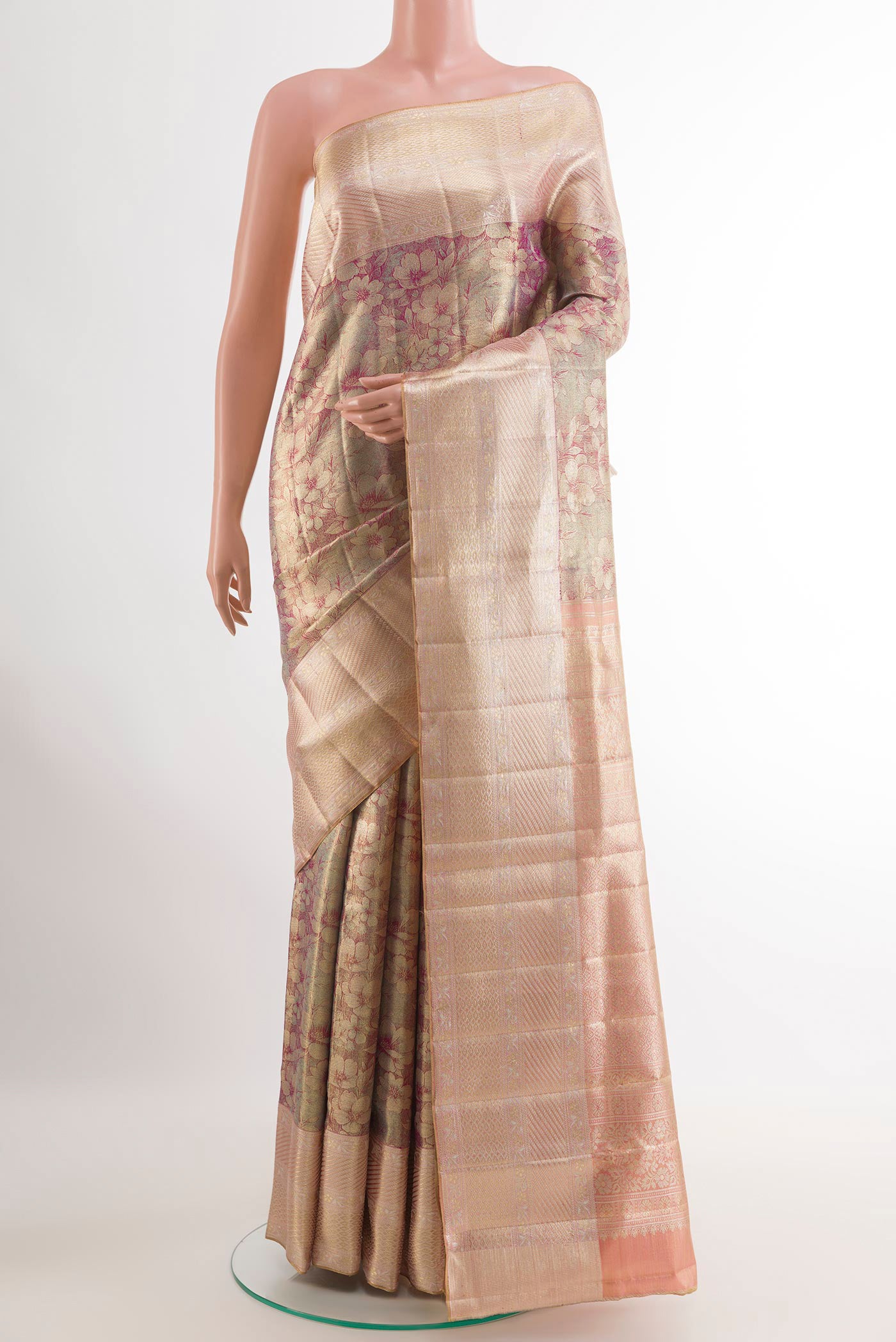Lavender Kanjivaram Tissue Silk Saree with Zari Brocade on the body and Zari Border.  displayed on a mannequin