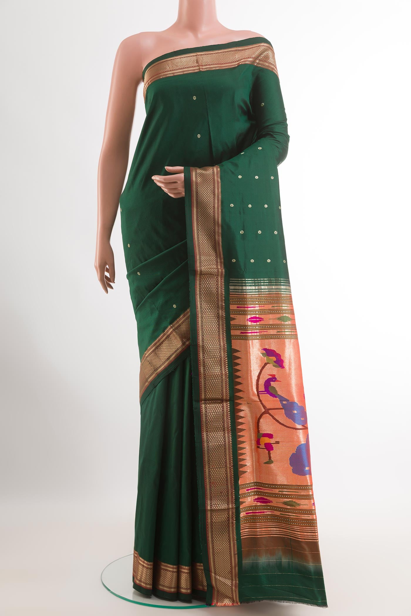 Green Paithani Silk Saree with Zari Butta on the body and Zari Border.  displayed on a mannequin