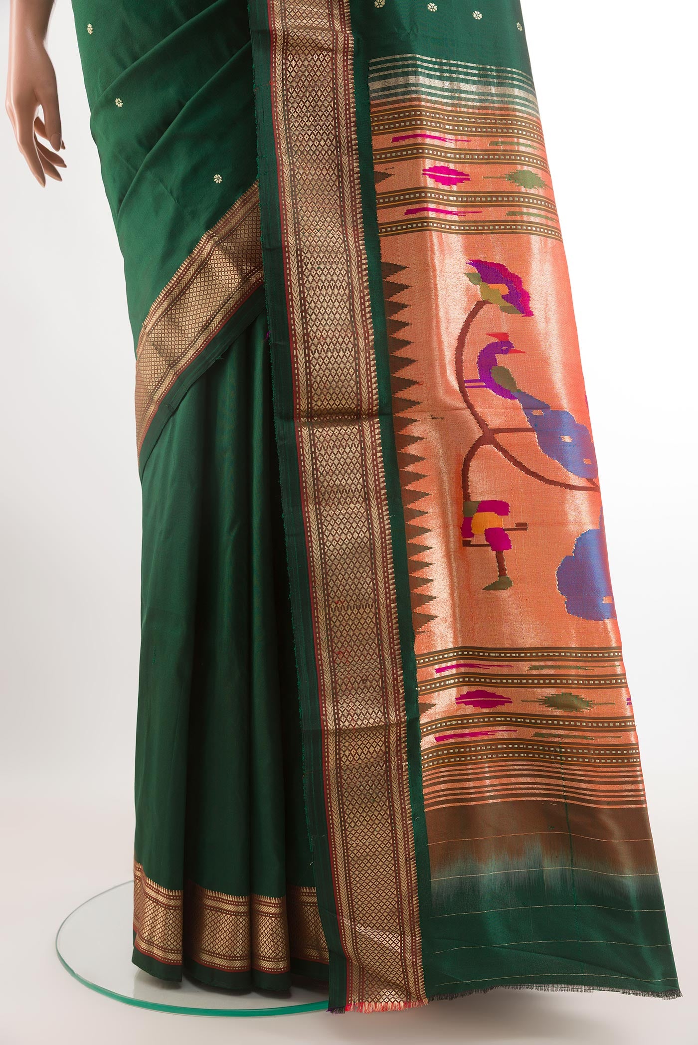 Pleats and pallu of Green Paithani Silk Saree with Zari Butta on the body and Zari Border. 