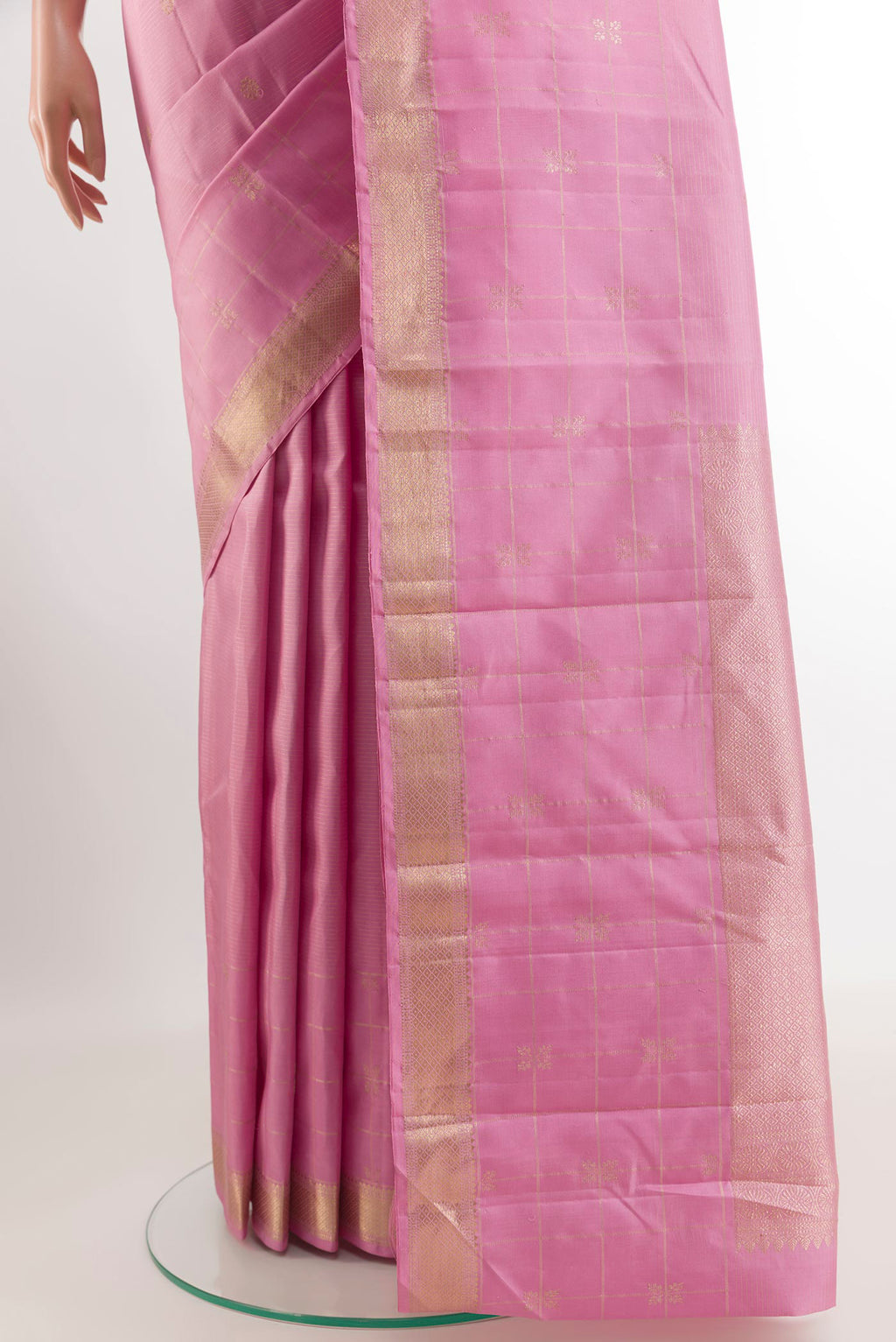 Pleats and pallu of Pink Kanjivaram Silk Saree with Zari Butta on the body and Zari Border. 