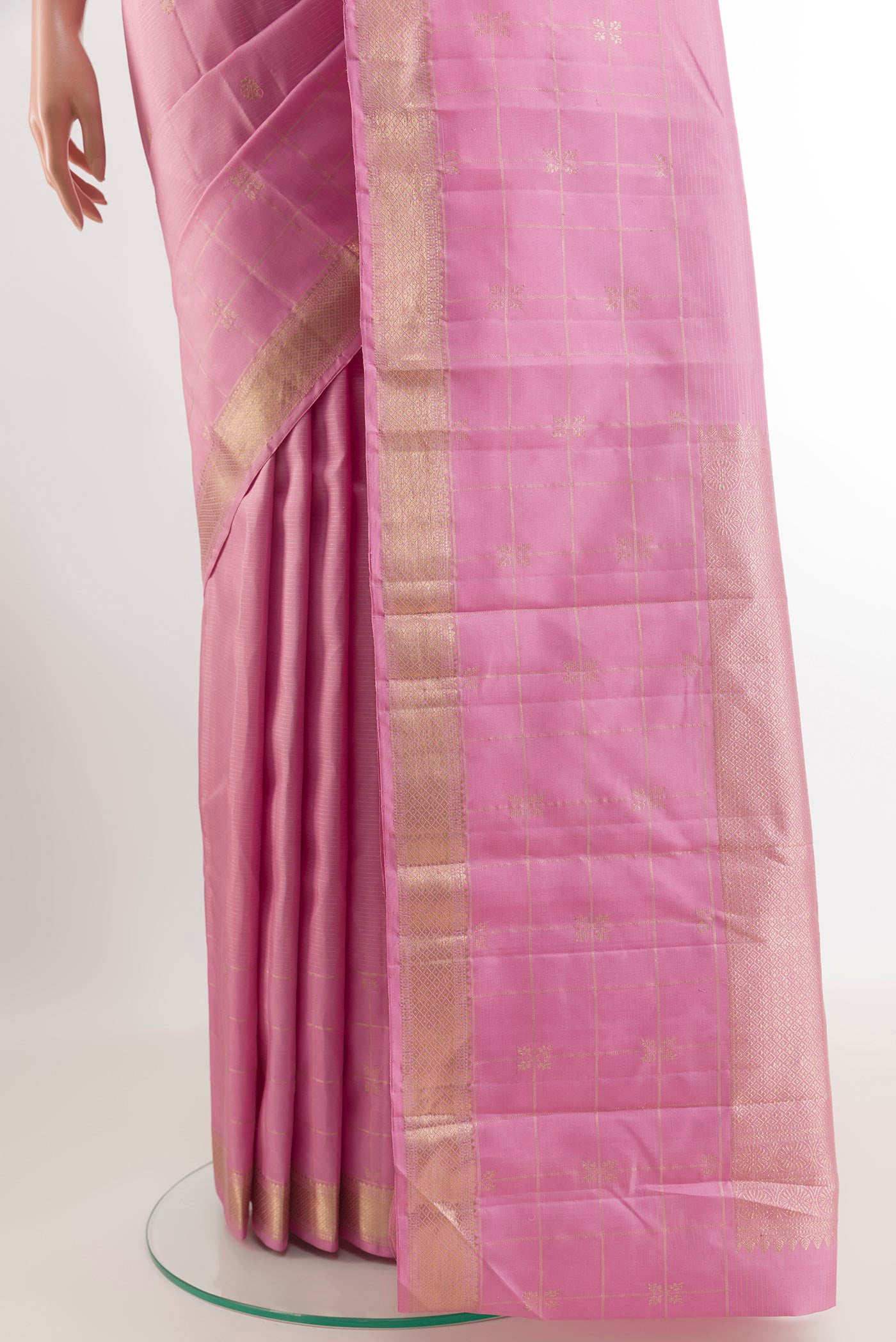 Pleats and pallu of Pink Kanjivaram Silk Saree with Zari Butta on the body and Zari Border. 