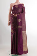 Purple Kanchipuram Silk Saree with Zari Butta on the body and Zari Border.  displayed on a mannequin
