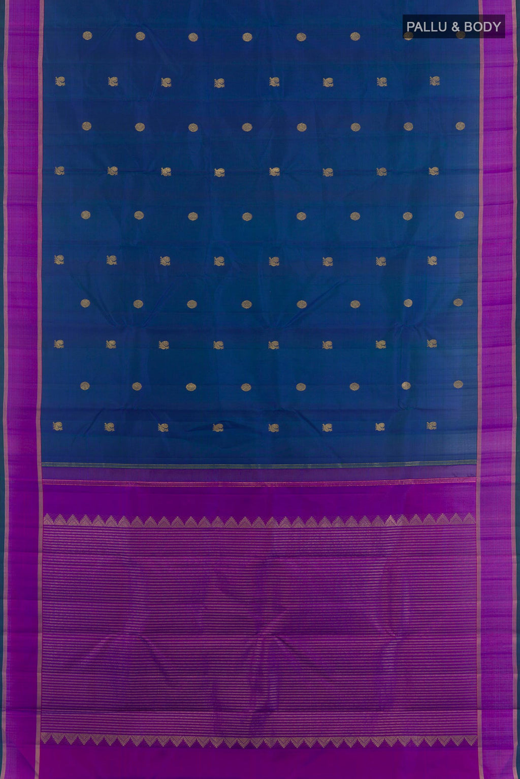 Flat view of Peacock Blue Kanchipuram Silk Saree with Zari Butta on the body and Zari Border. 
