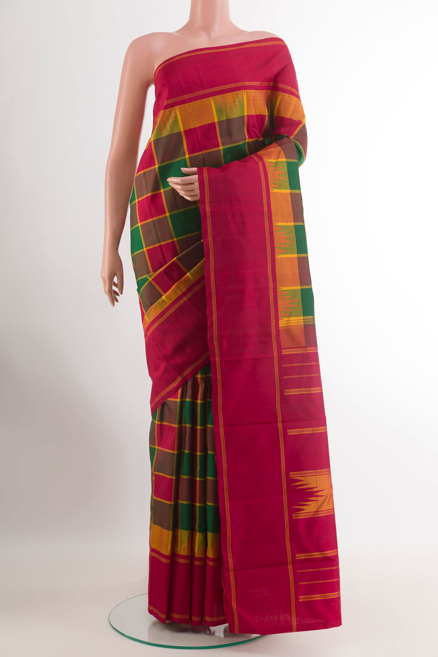 Multi Color Kanjivaram Silk Saree with Checked design on the body and Zari Border.  displayed on a mannequin