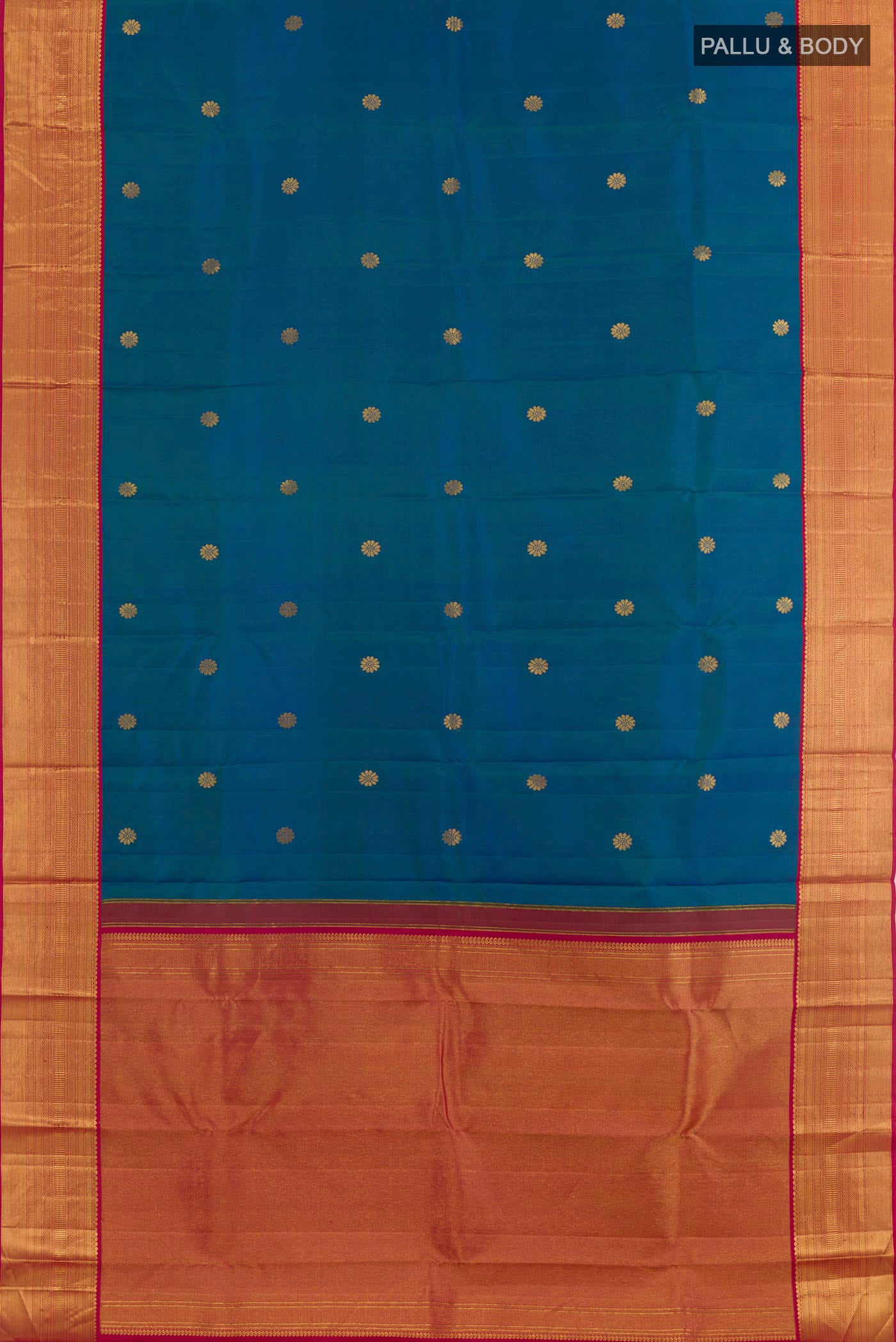 Flat view of Peacock Blue Kanjivaram Silk Saree with Zari Butta on the body and Zari Border. 