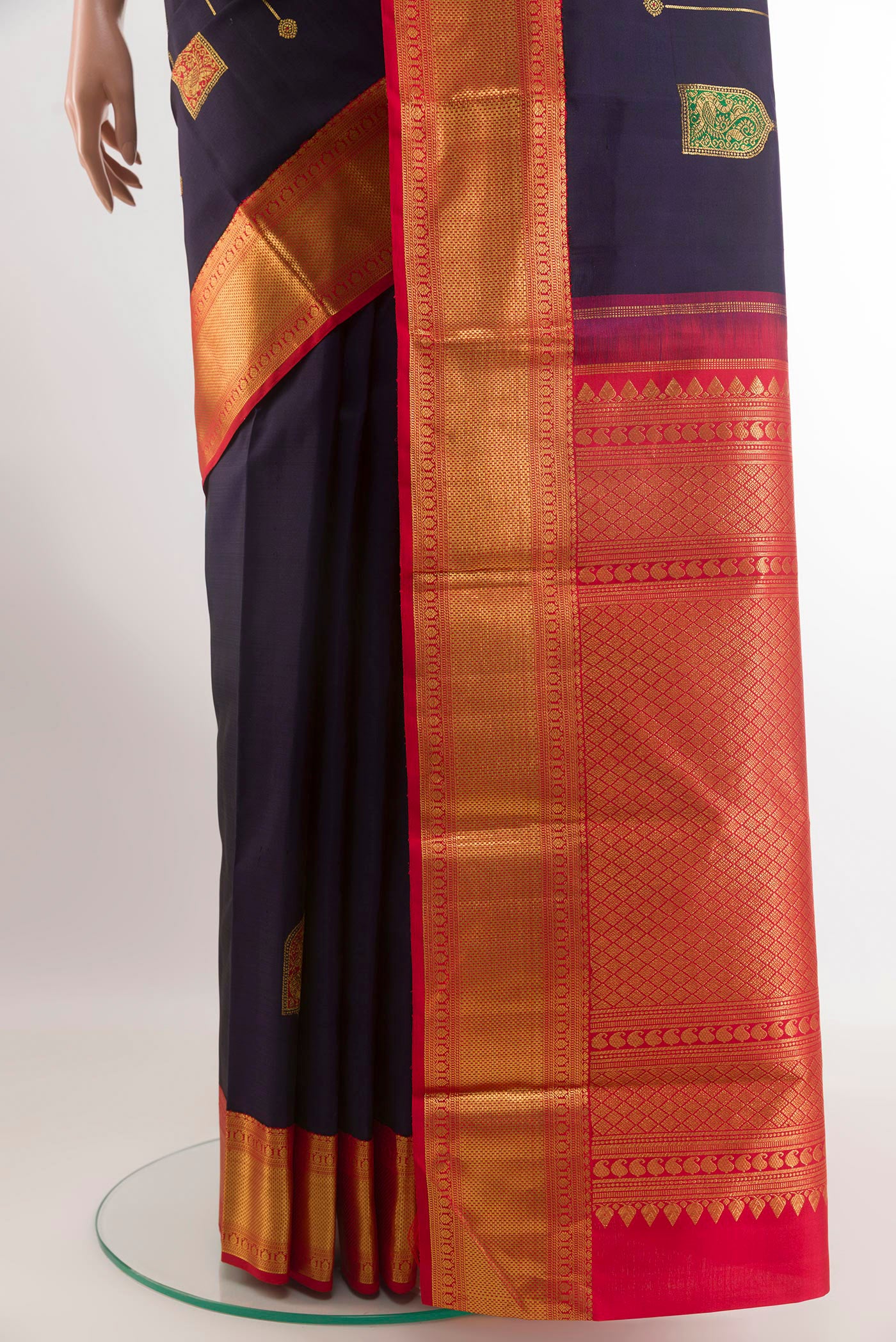Pleats and pallu of Blue Kanchipuram Silk Saree with Zari Butta on the body and Zari Border. 