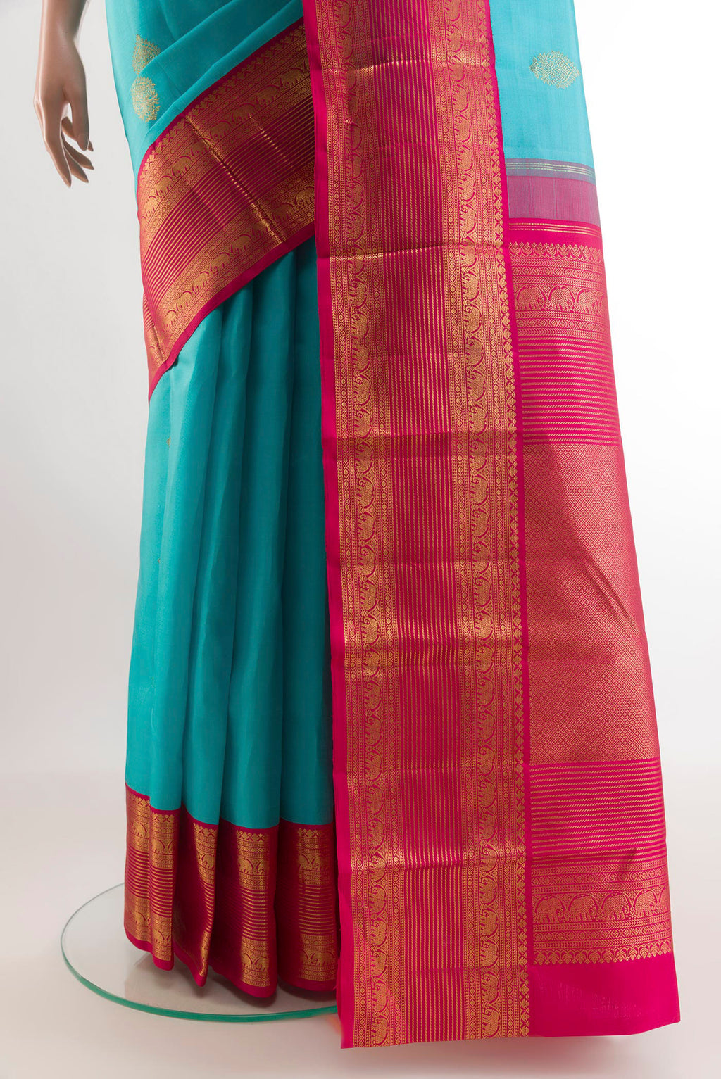 Pleats and pallu of Blue Kanjivaram Silk Saree with Zari Butta on the body and Zari Border. 