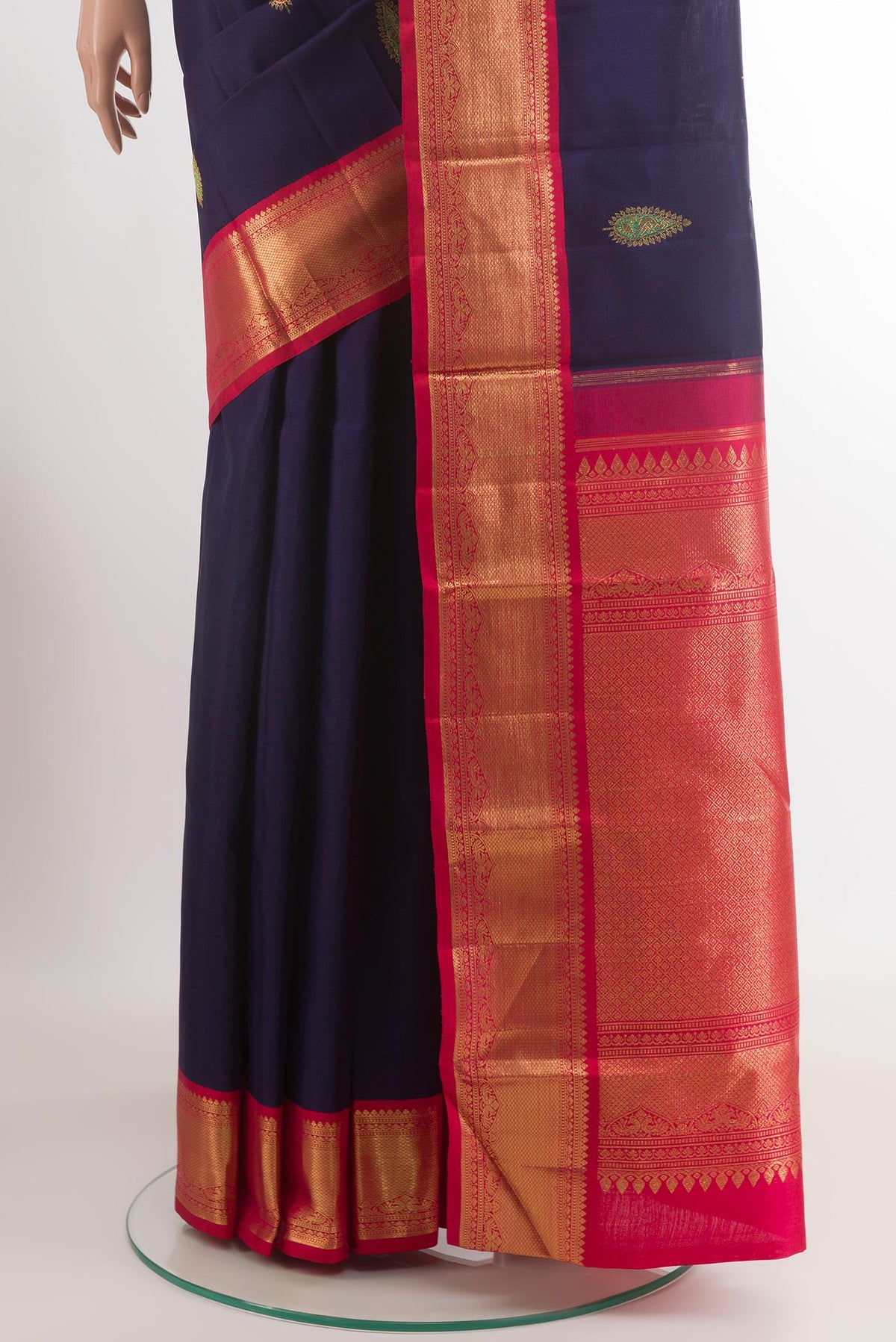 Pleats and pallu of Blue Kanjivaram Silk Saree with Zari Butta on the body and Zari Border. 