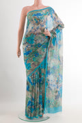 Blue Chiffon Saree with Printed design on the body and Plain Border.  displayed on a mannequin