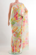 Light Green Chiffon Saree with Printed design on the body and Plain Border.  displayed on a mannequin