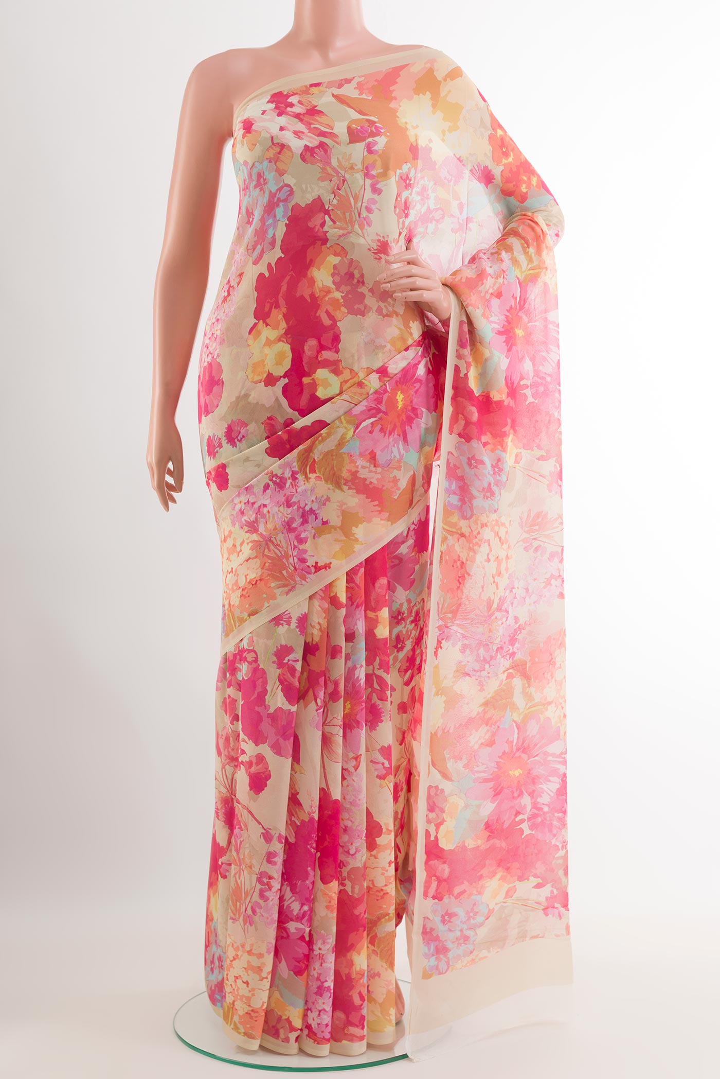 Beige Chiffon Saree with Printed design on the body and Plain Border.  displayed on a mannequin