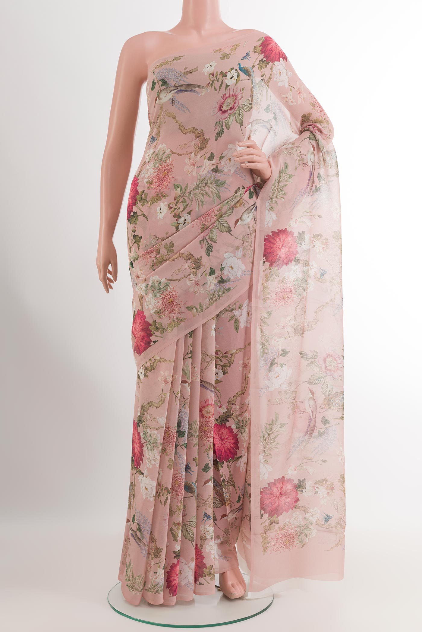 Rose pink Chiffon Saree with Printed design on the body and Plain Border.  displayed on a mannequin
