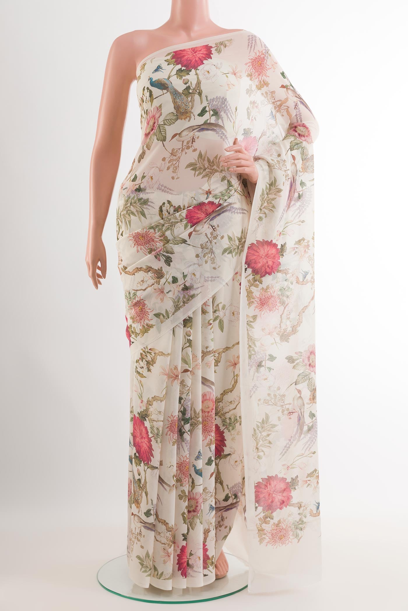 Off White Chiffon Saree with Printed design on the body and Plain Border.  displayed on a mannequin