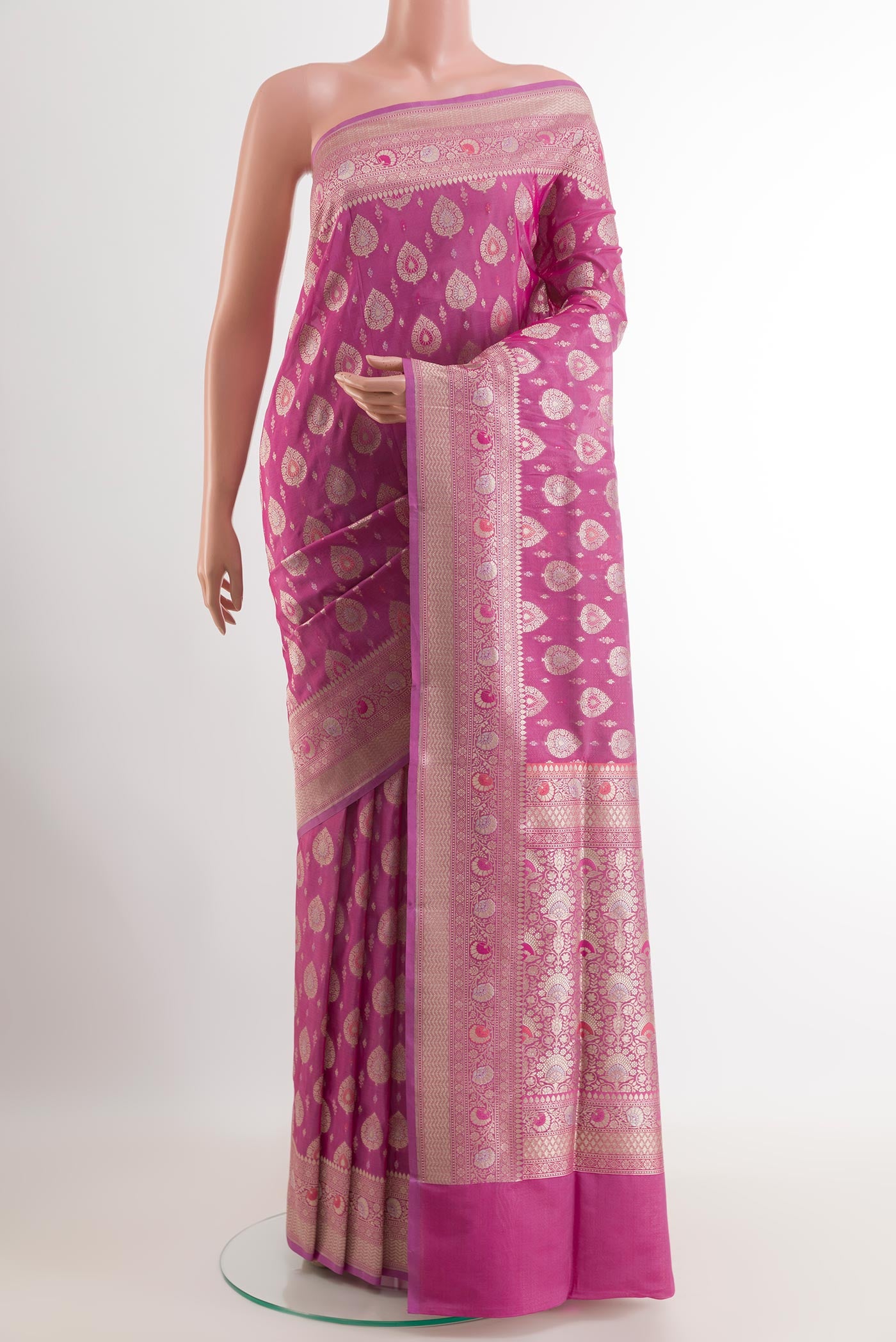 Pink Banarasi Silk Saree with Zari Butta on the body and Zari Border.  displayed on a mannequin