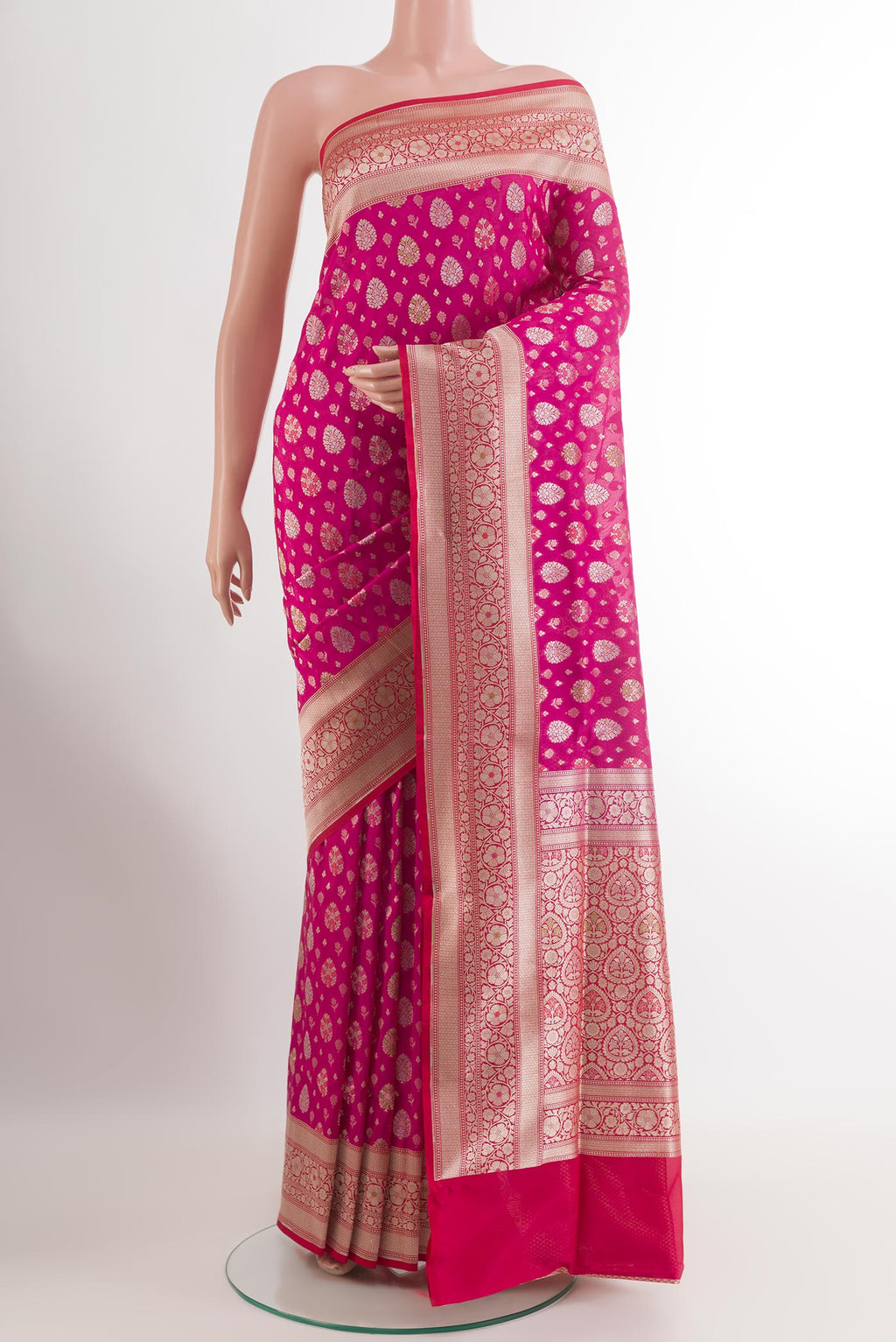 Pink Banarasi Silk Saree with Zari Brocade on the body and Zari Border.  displayed on a mannequin