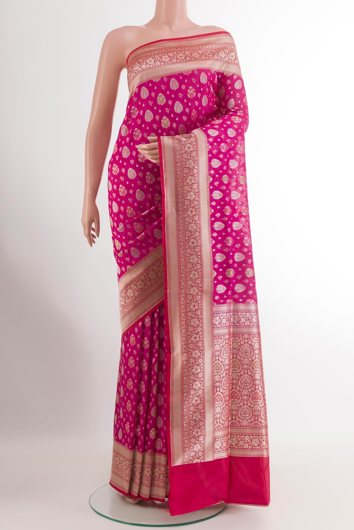 Pink Banarasi Silk Saree with Zari Brocade on the body and Zari Border.  displayed on a mannequin