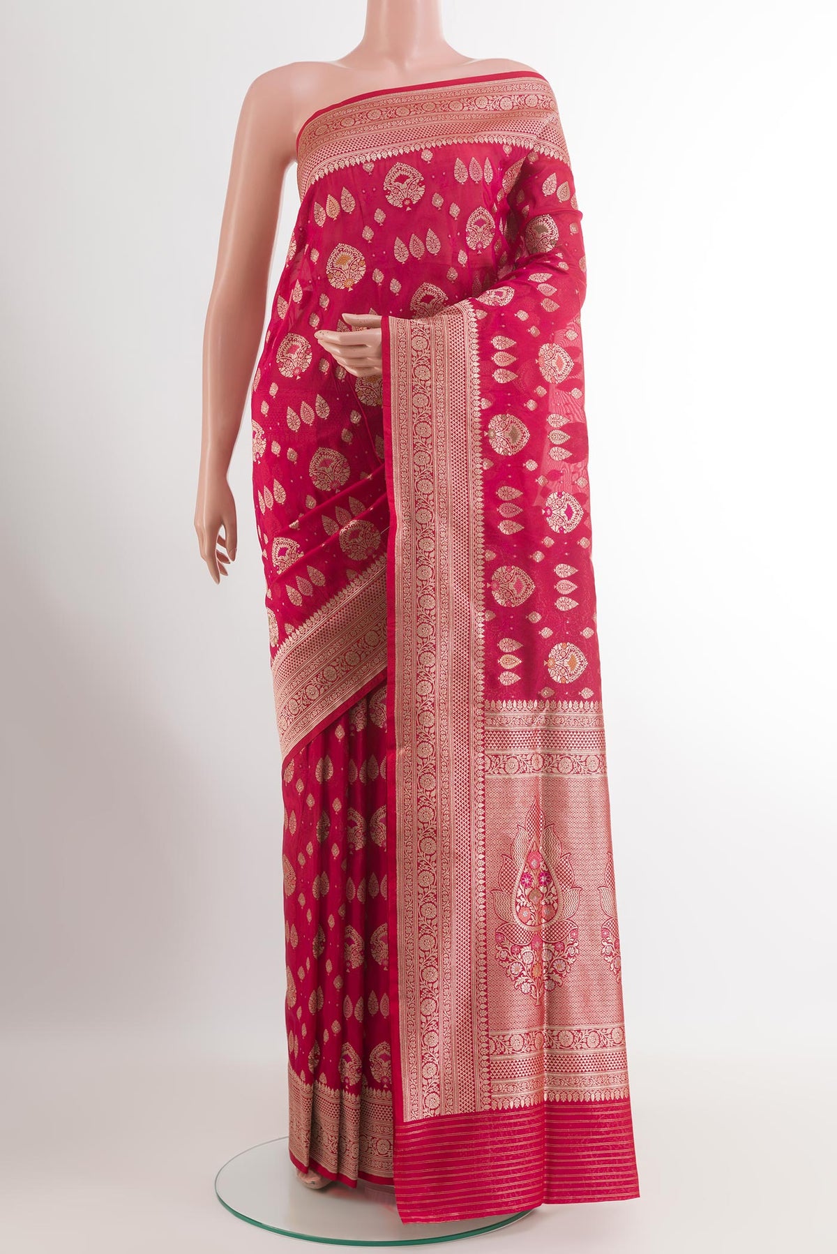 Red Banarasi Silk Saree with Zari Butta on the body and Zari Border.  displayed on a mannequin