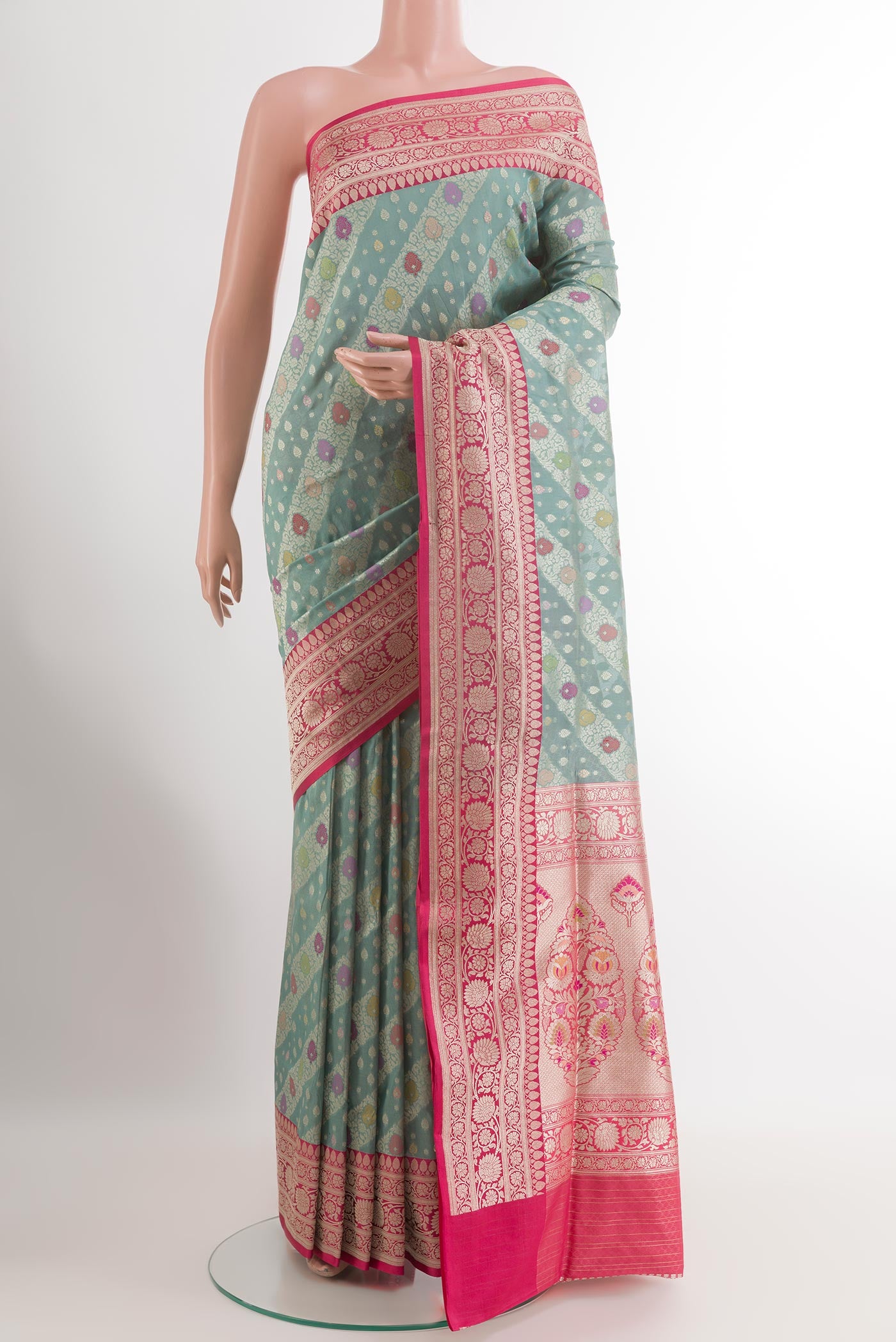 Grey Banarasi Silk Saree with Zari Brocade on the body and Zari Border.  displayed on a mannequin