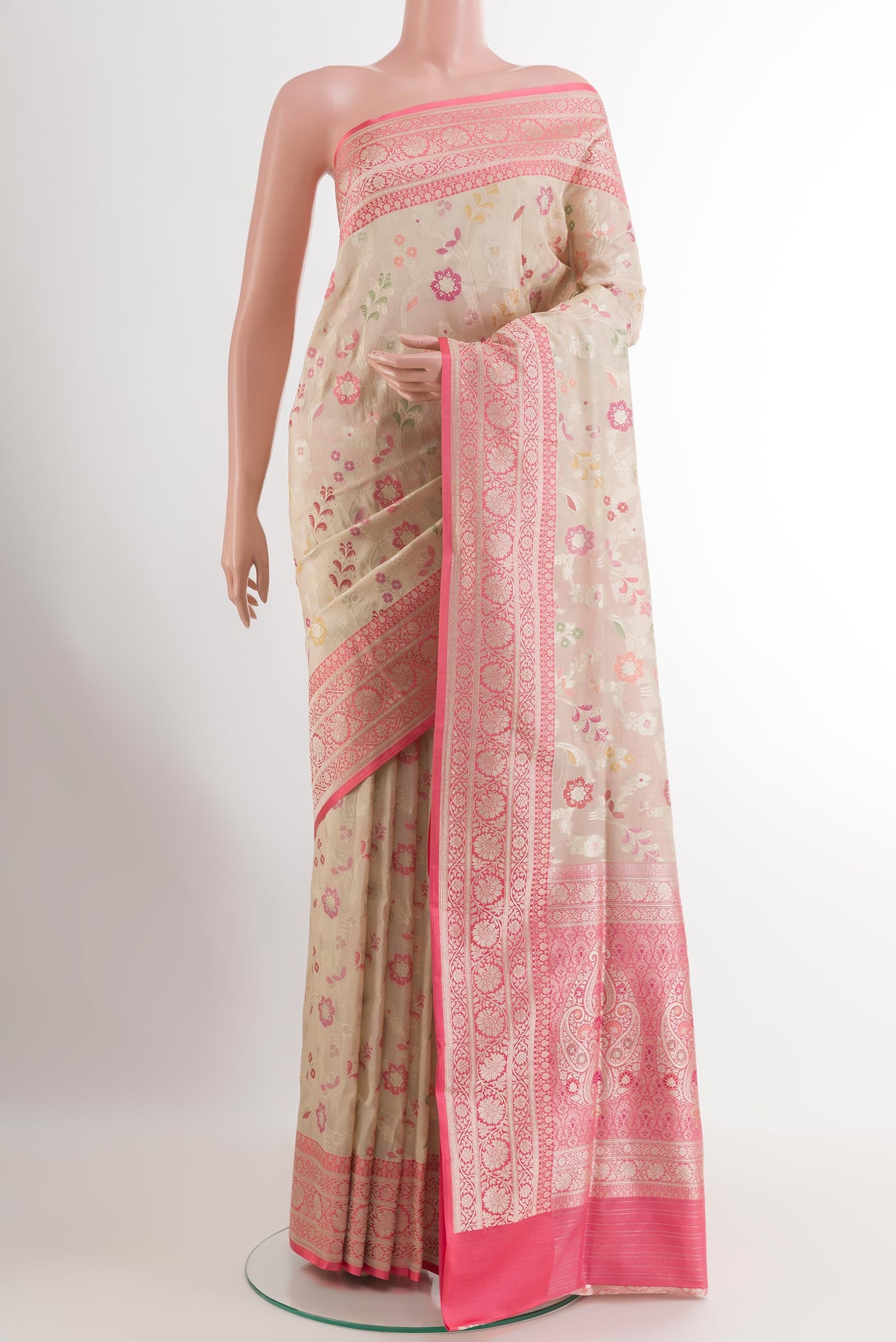 Off White Banarasi Silk Saree with Zari Brocade on the body and Zari Border.  displayed on a mannequin