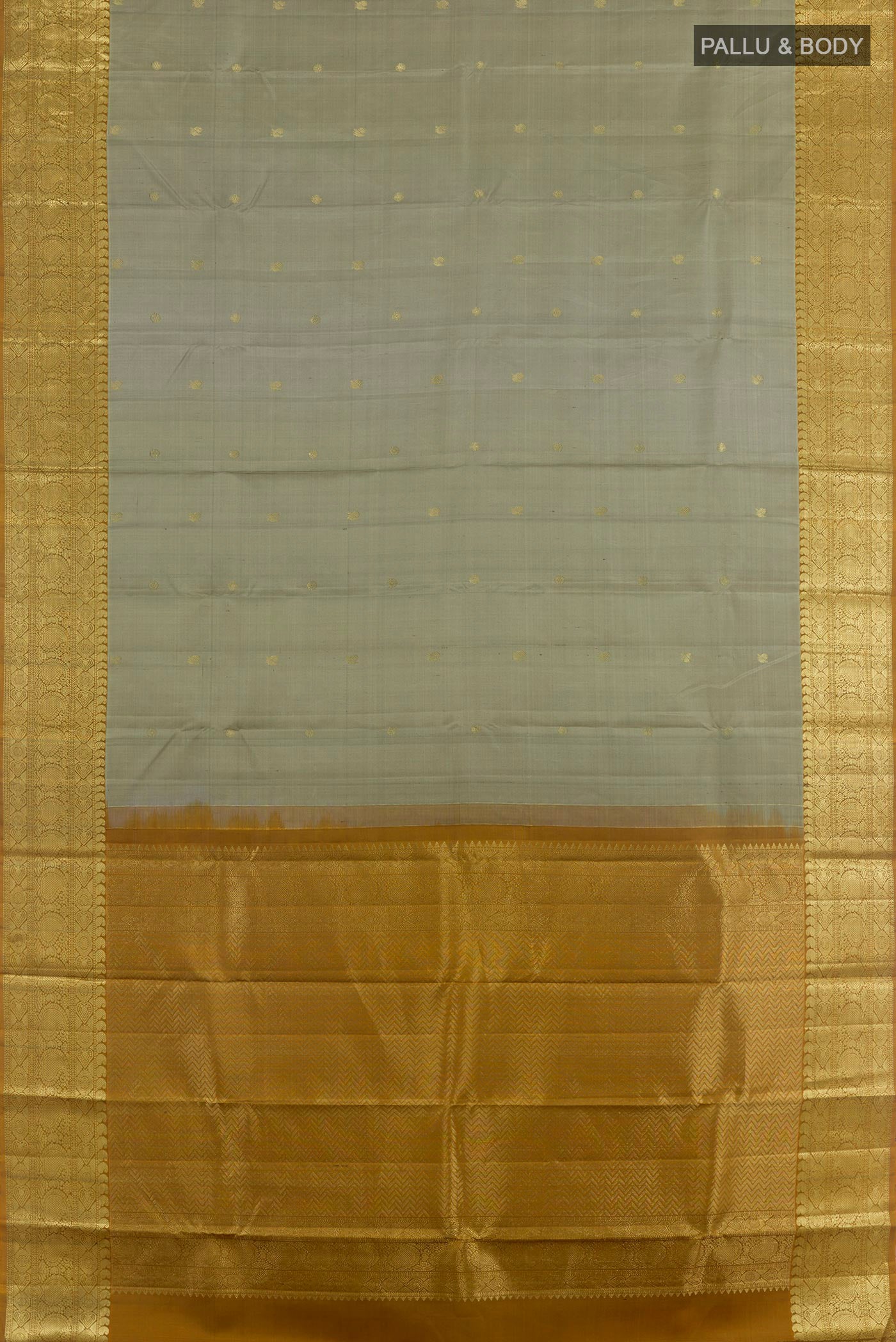Flat view of Grey Kanchipuram Silk Saree with Zari Butta on the body and Zari Border. 