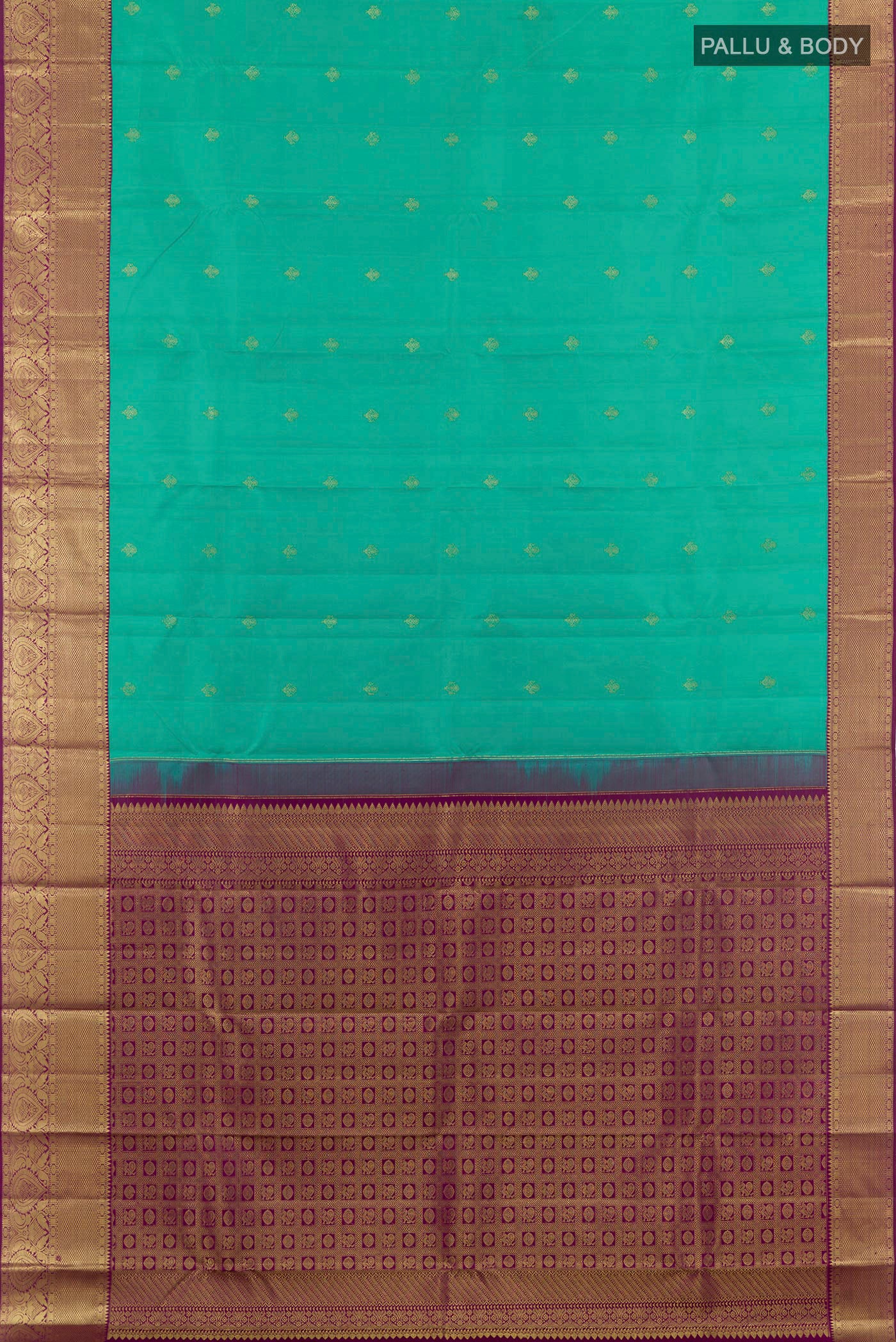 Flat view of Green Kanjivaram Silk Saree with Zari Butta on the body and Zari Border. 