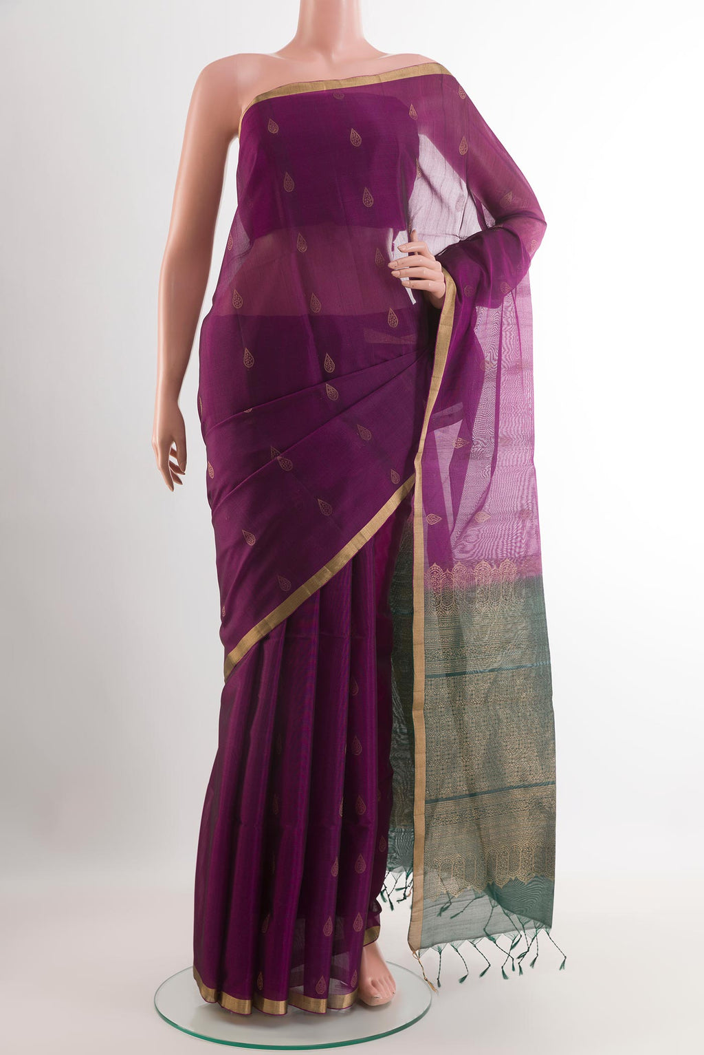 Purple Blended Kora Cotton Saree with Zari Butta on the body and Zari Border.  displayed on a mannequin
