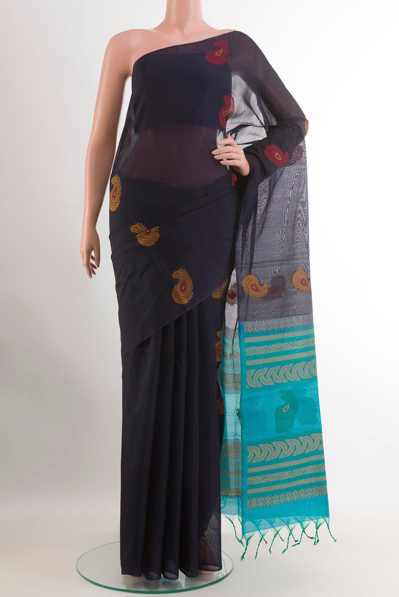 Dark Blue Blended Kora Cotton Saree with Thread Butta on the body and Zari Border.  displayed on a mannequin