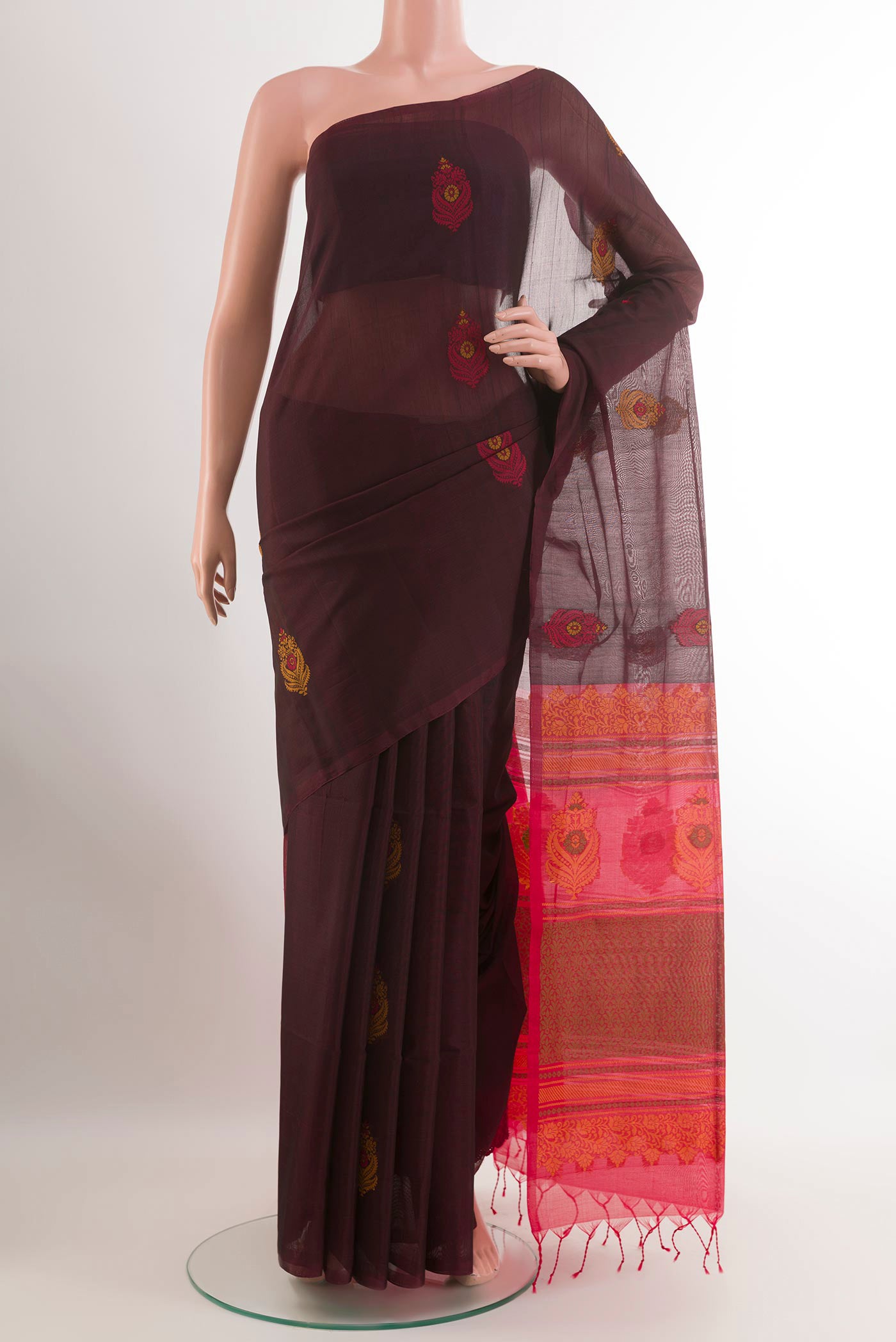 Brown Blended Kora Cotton Saree with Thread Butta on the body and Zari Border.  displayed on a mannequin